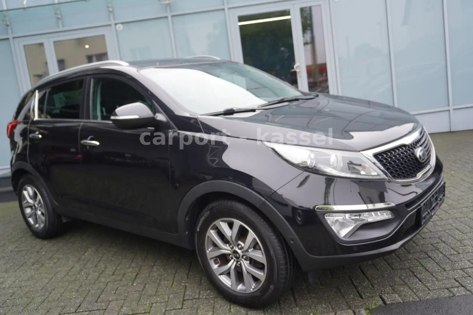 Kia Sportage Dream Team 2WD Navi/Leder/AHK/Euro 6 Schwarz - 1
