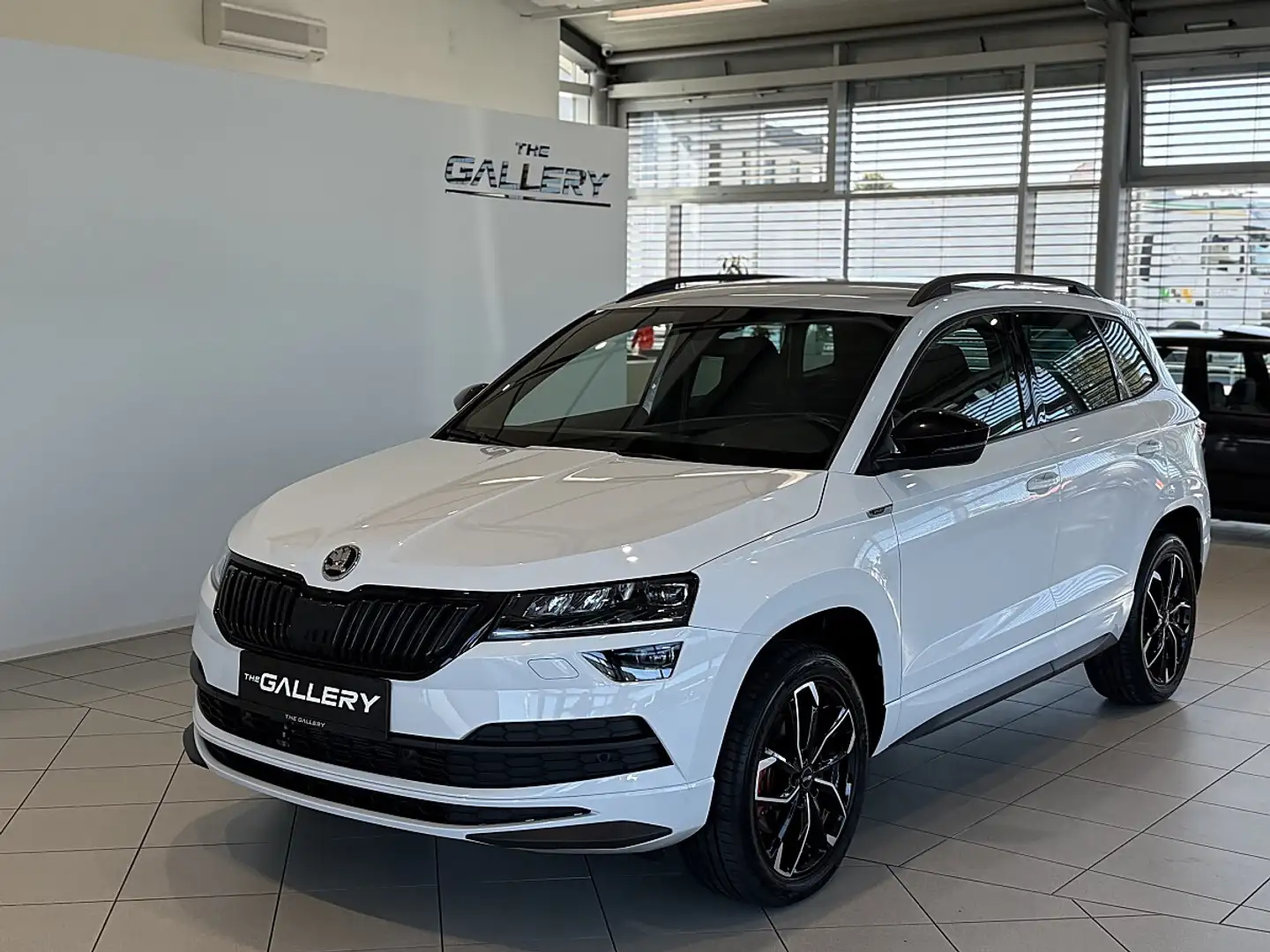 Skoda Karoq 2,0 TDI SCR 4x4 Sportline DSG*AHK*ACC*Kamera*LED Weiß - 1