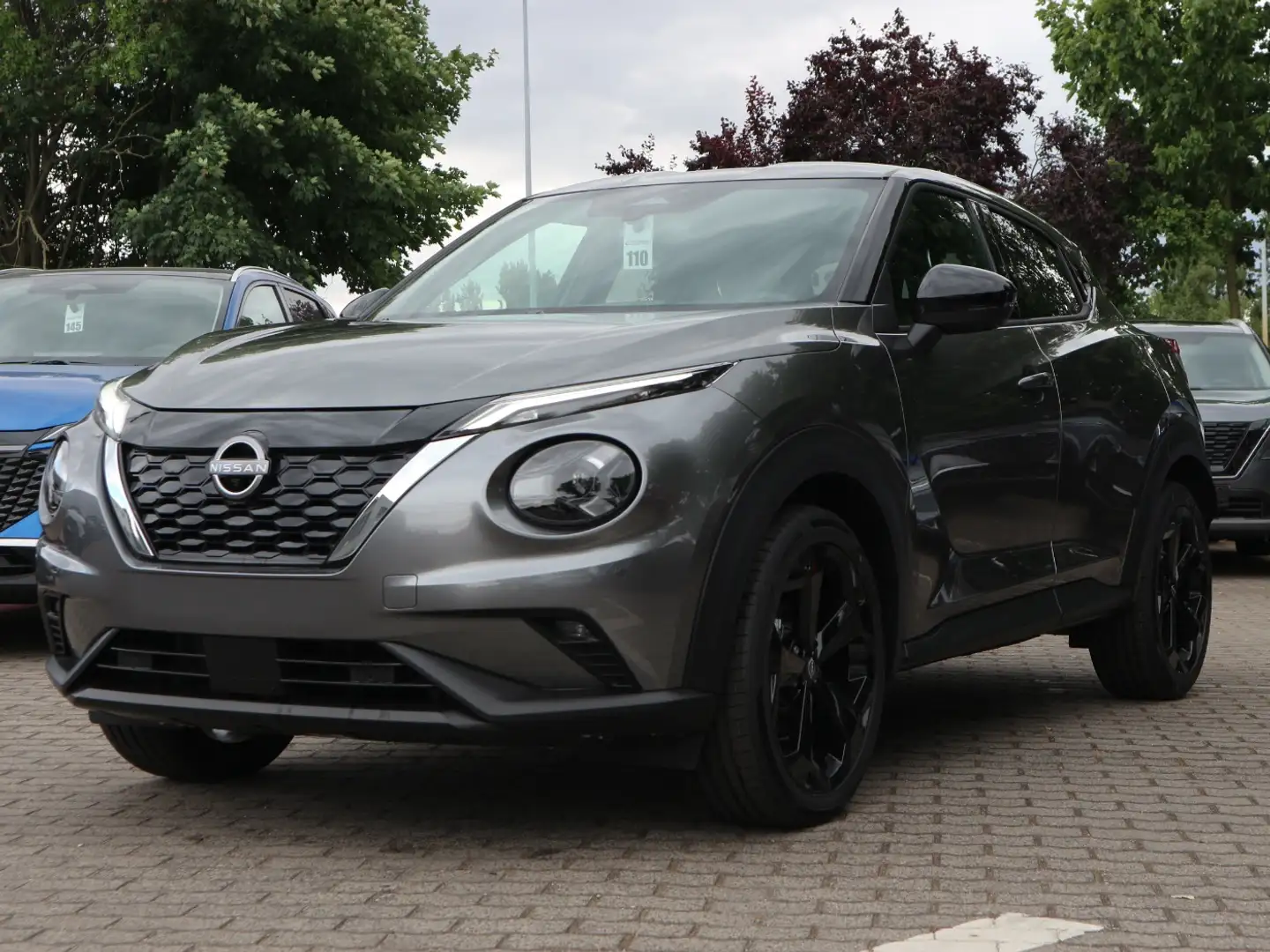 Nissan Juke TEKNA 1.6 HYBRID 4AMT ProPilot 360° LM Grijs - 2