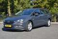 Opel Astra 1.4 Turbo | Navi | PDC | Stoelverw. | Climate | Cr Grijs - thumbnail 1
