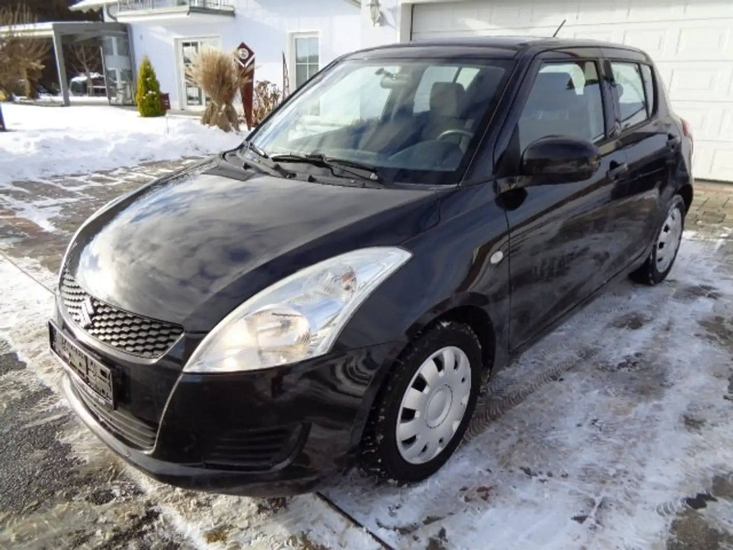 Suzuki Swift Swift  5-Türer 1.2i, Klima, eFh., Funk, WR, met Schwarz - 1
