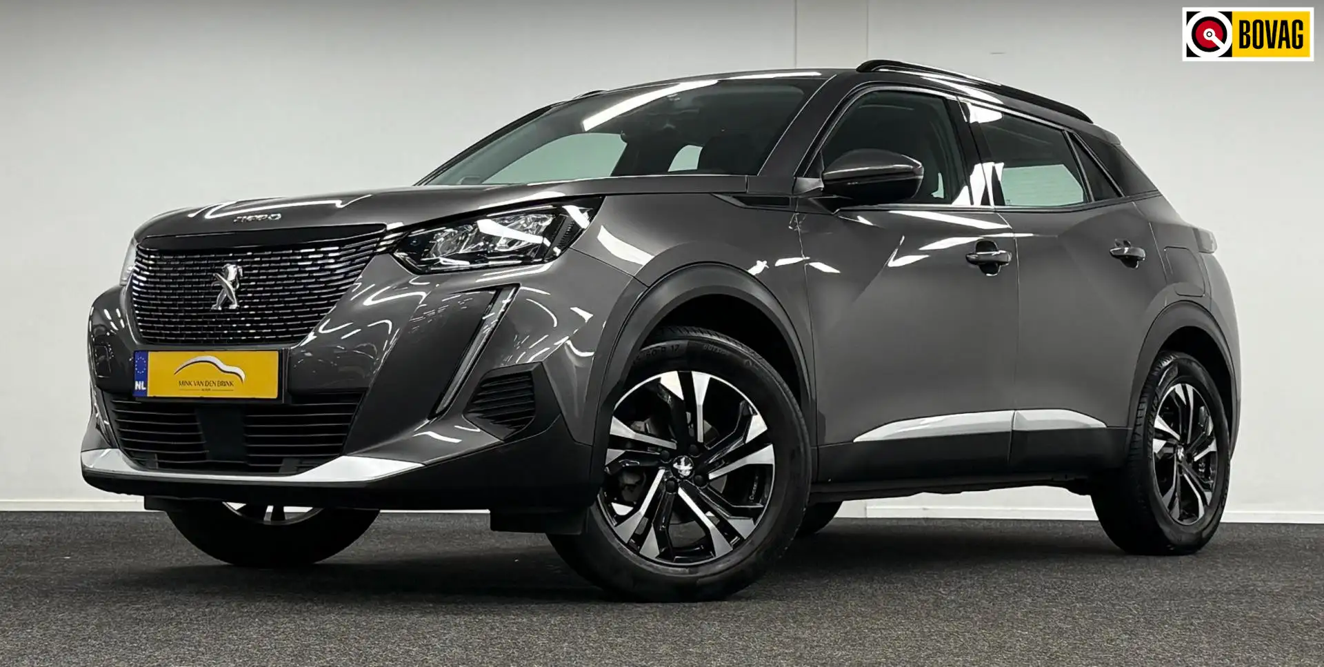 Peugeot 2008 1.2 PureTech Allure Pack*DealerOh*Automaat*Navi*Ca Grijs - 1