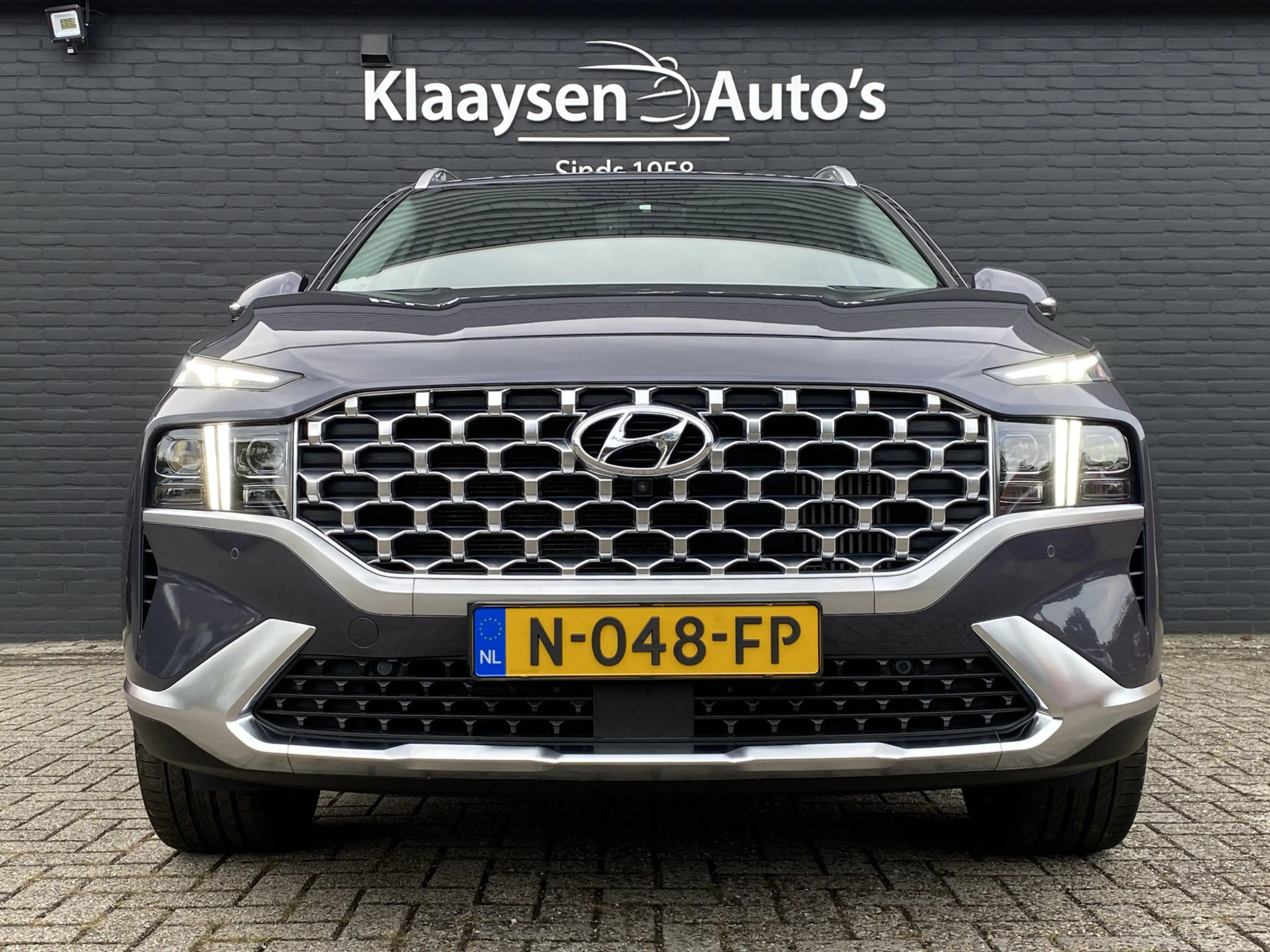 Hyundai SANTA FE 1.6 T-GDI HEV 230 pk Premium AUT. | dealer onderh. — photo 2