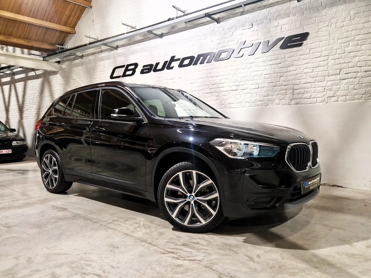 BMW X1 sDrive18i Automaat met garantie Noir - 1