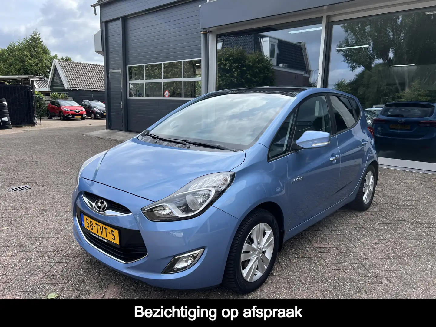 Hyundai iX20 1.4i i-Vision Schuifdak, Trekhaak, ruise, Clima Bleu - 1