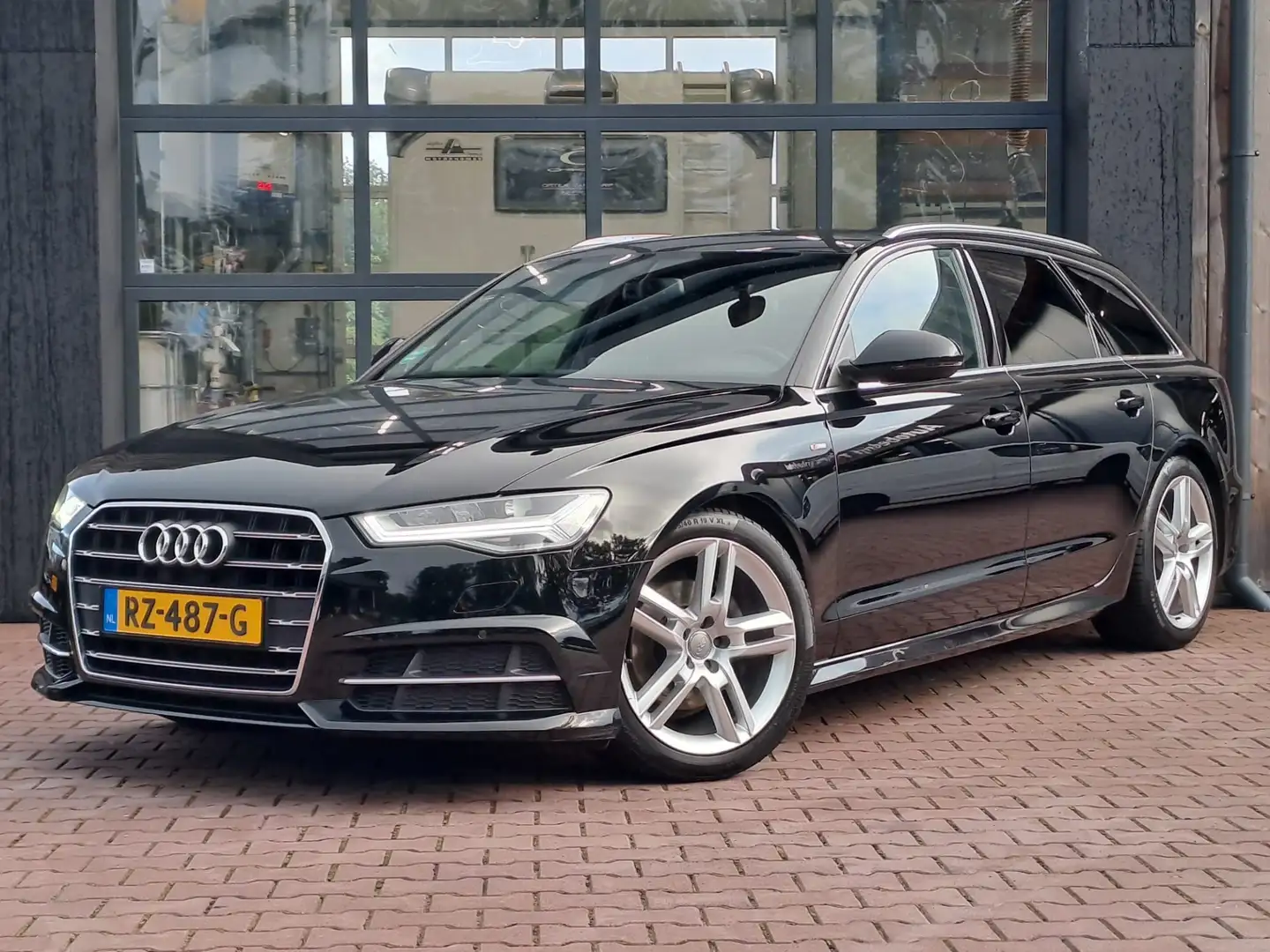Audi A6 Avant 1.8 TFSI ultra Advance Sport S-line | Automa Zwart - 1