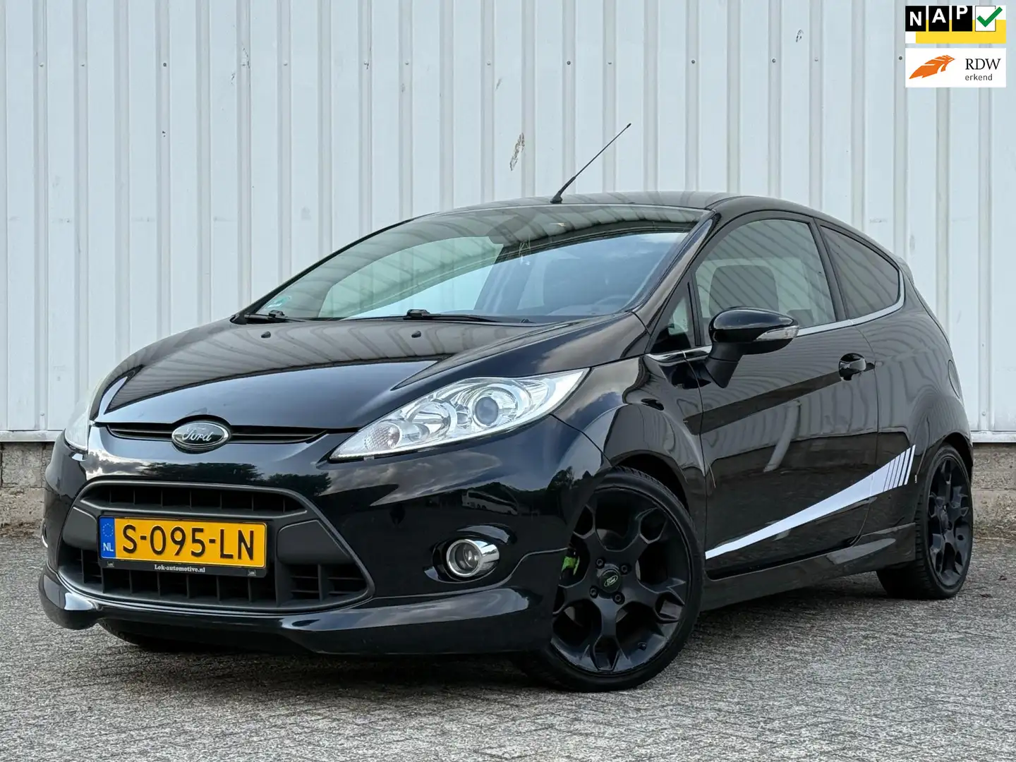 Ford Fiesta 1.6 Ghia 120PK,Stoelverwarming,Airco,ElektrischeRa Black - 1