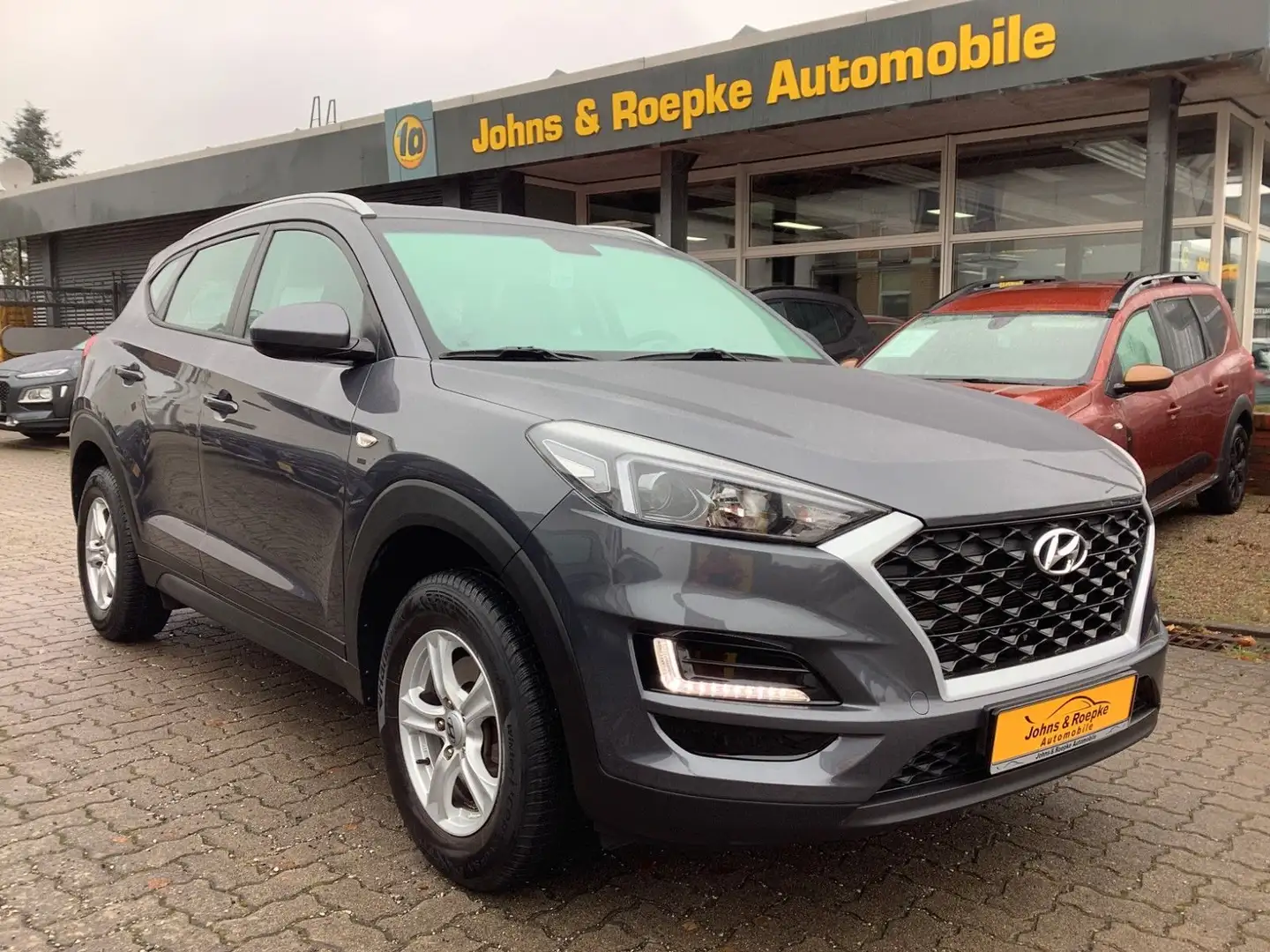Hyundai TUCSON Select 1,6 / NAVI / SITZ-HZG / TEMP/LIM Grau - 1
