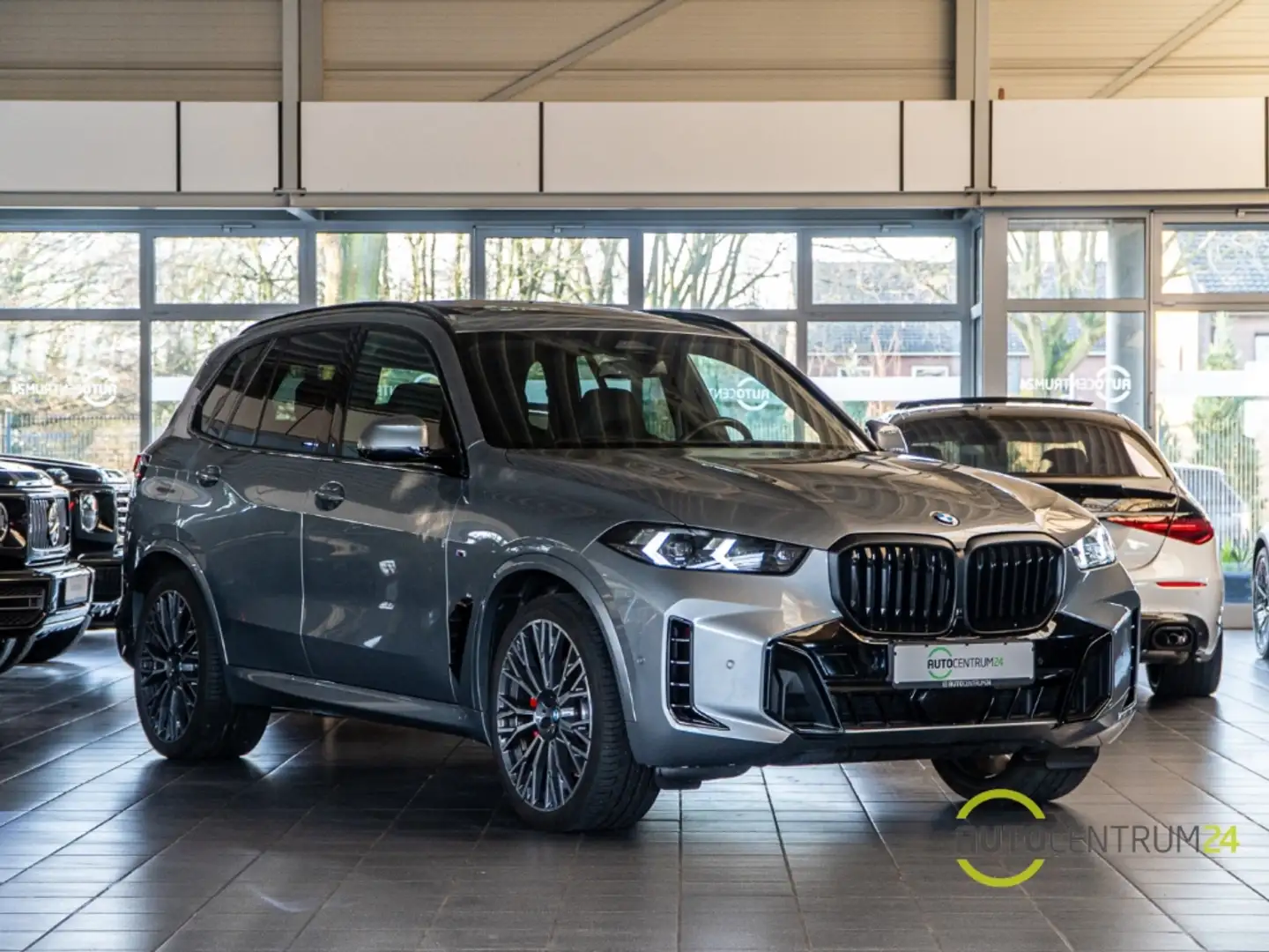 BMW X5 30d MSport 7-Sitzer HK Pano Carbon Luft AHK Grau - 1