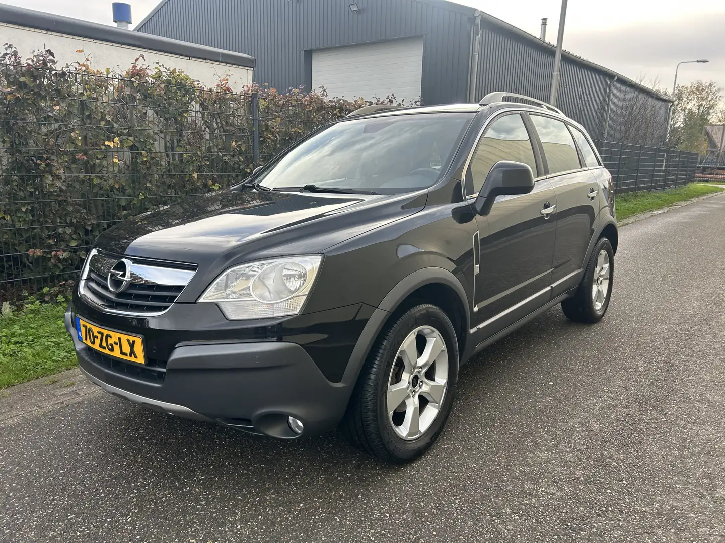 Opel Antara 3.2 V6 Cosmo / AUTOMAAT / LEER / CRUISE / 146dkm! Zwart - 1