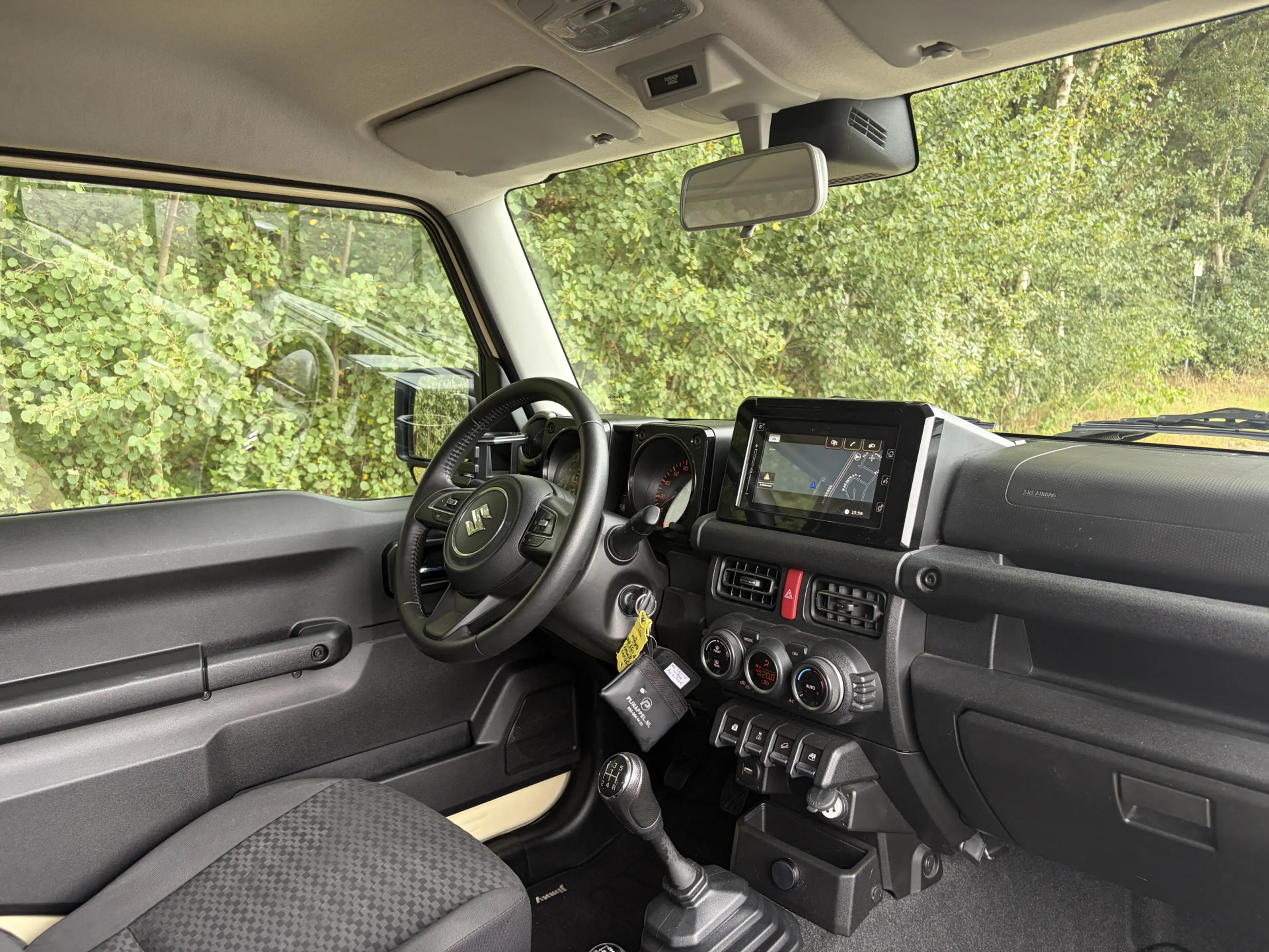 Suzuki Jimny 1.5 Comfort 4x4 Cruise Trekhaak — photo 44