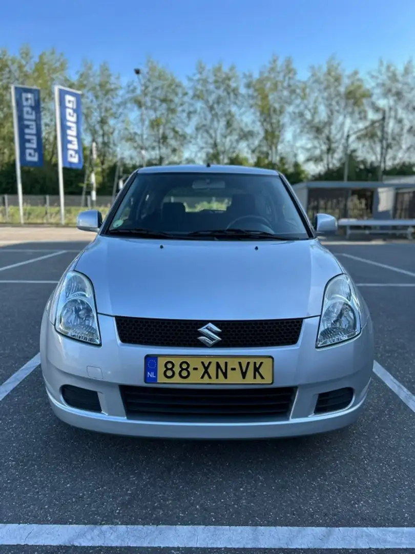 Suzuki Swift 1.3 GLS Gris - 1