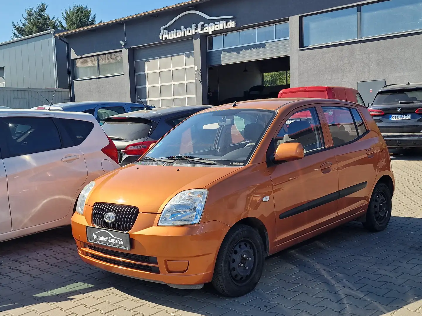 Kia Picanto 1.1 EX/2.Ha/Tüv12.26/AHK/Klima/5.Tür/ZV/Gepf Orange - 1