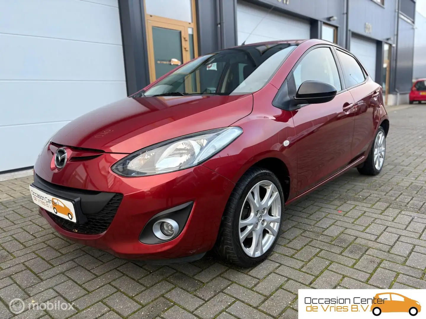 Mazda 2 1.3 Airco Velgen Navi/Carplay Stoelverwarmd Trekha Rouge - 2