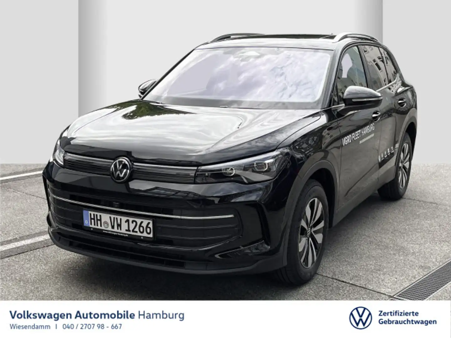 Volkswagen Tiguan 2.0 TDI DSG Goal Stdhzg Pano Navi Schwarz - 1