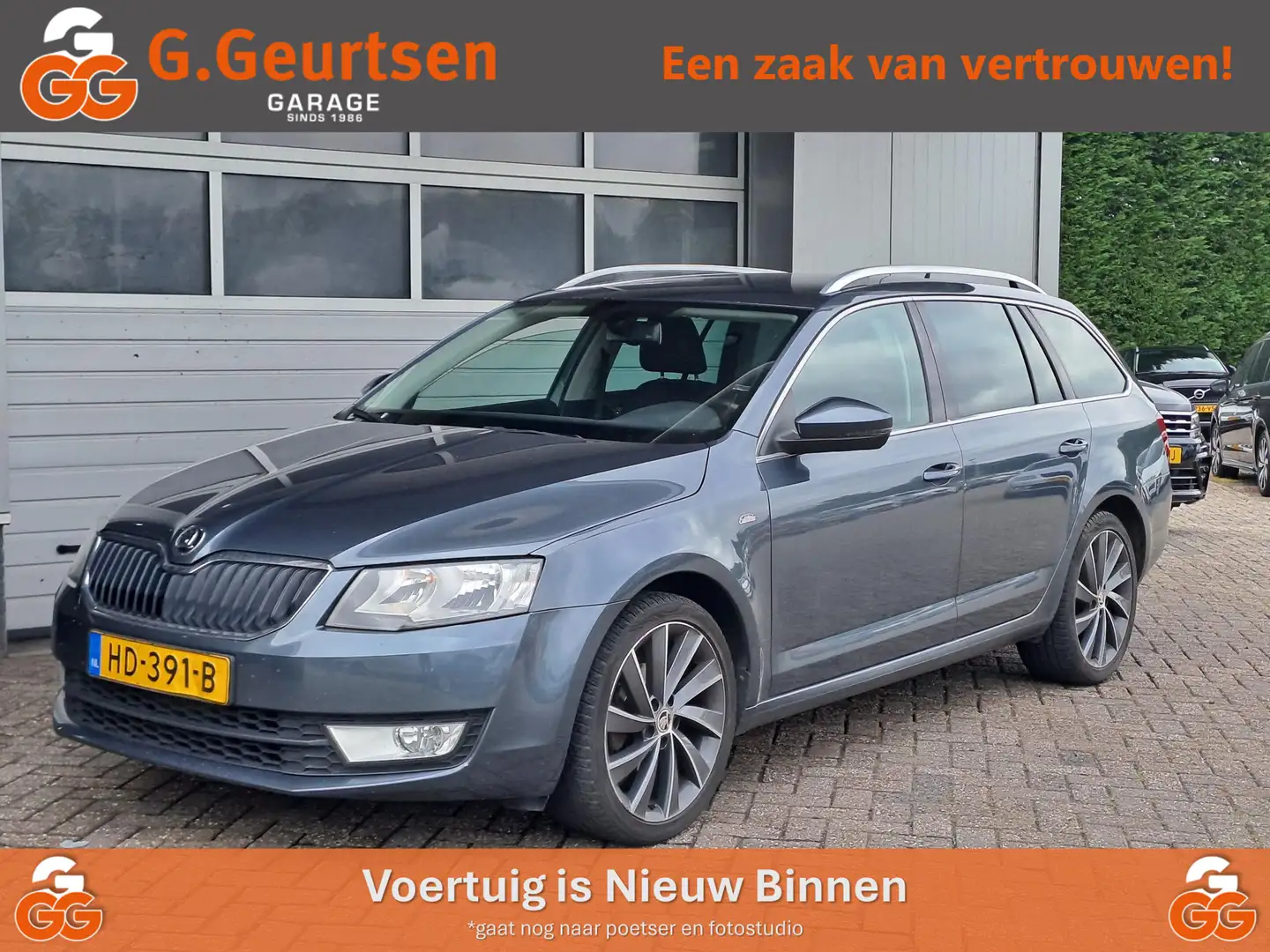 Skoda Octavia Combi 1.2 TSI Greentech Edition Businessline, Grijs - 1