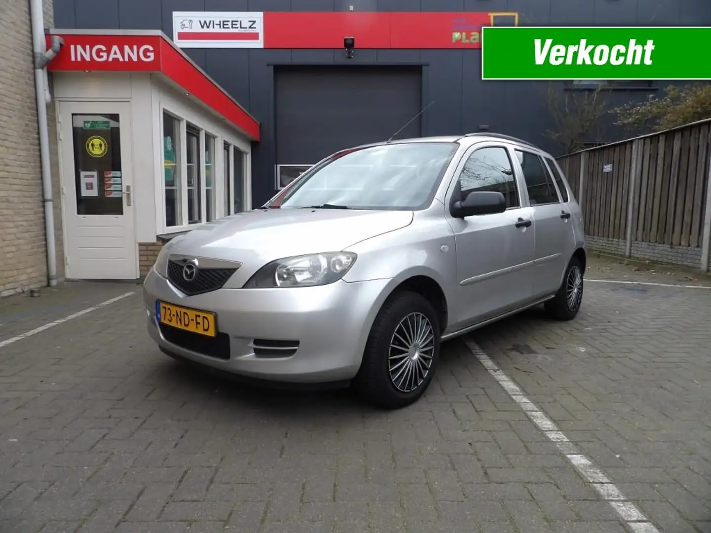 Mazda 2 1.4 5 drs - airco - nieuwe apk! - in zeer nette st Gris - 1