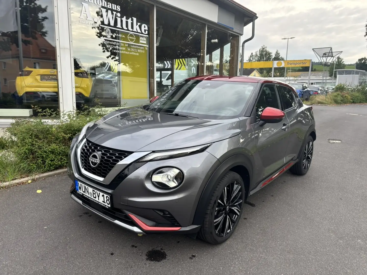 Nissan Juke F16 N-Design 1.0 DIG-T 6MT Tech MT NC Bose Grijs - 1