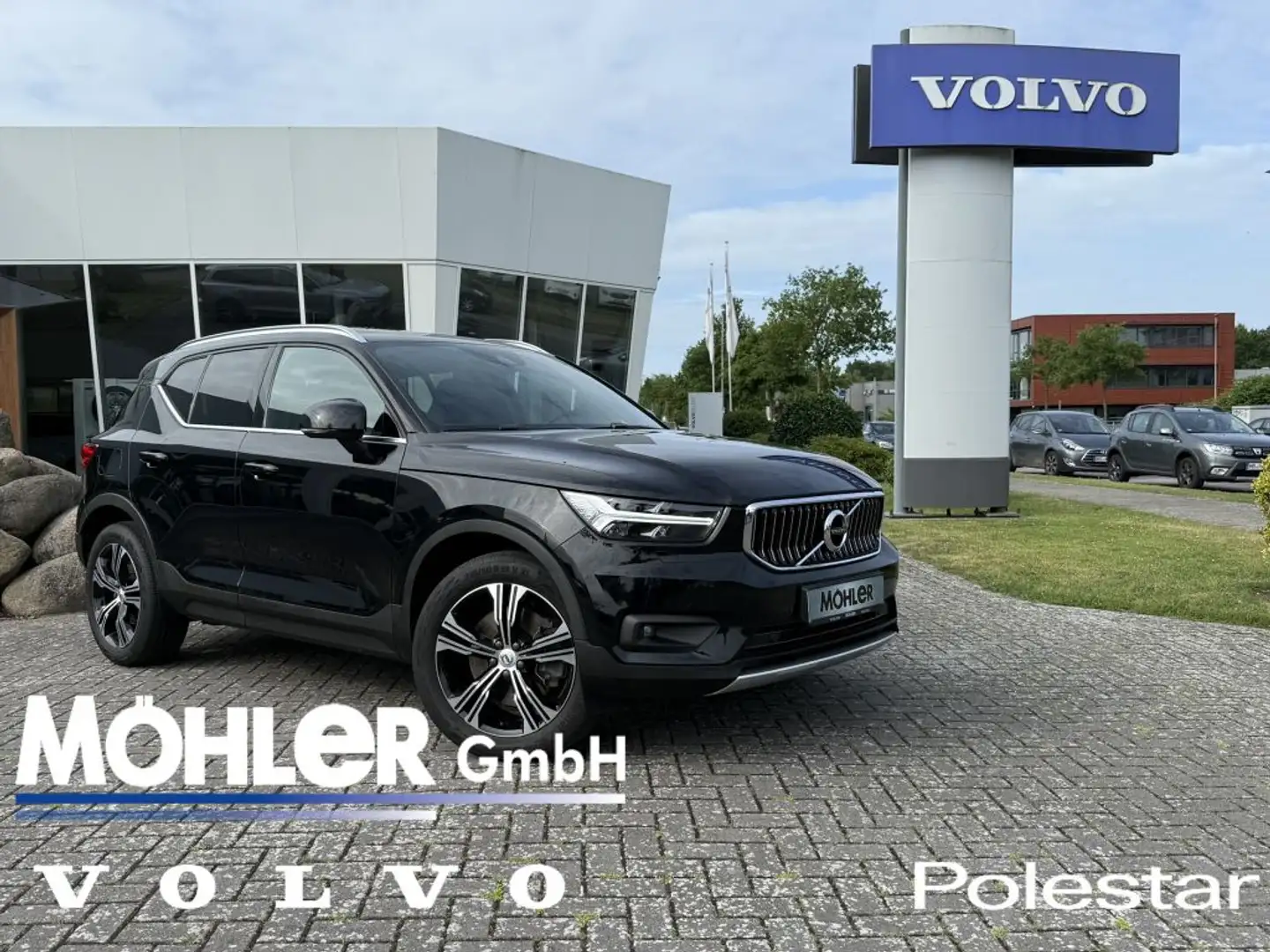 Volvo XC40 T4 Recharge DKG Core Zwart - 1