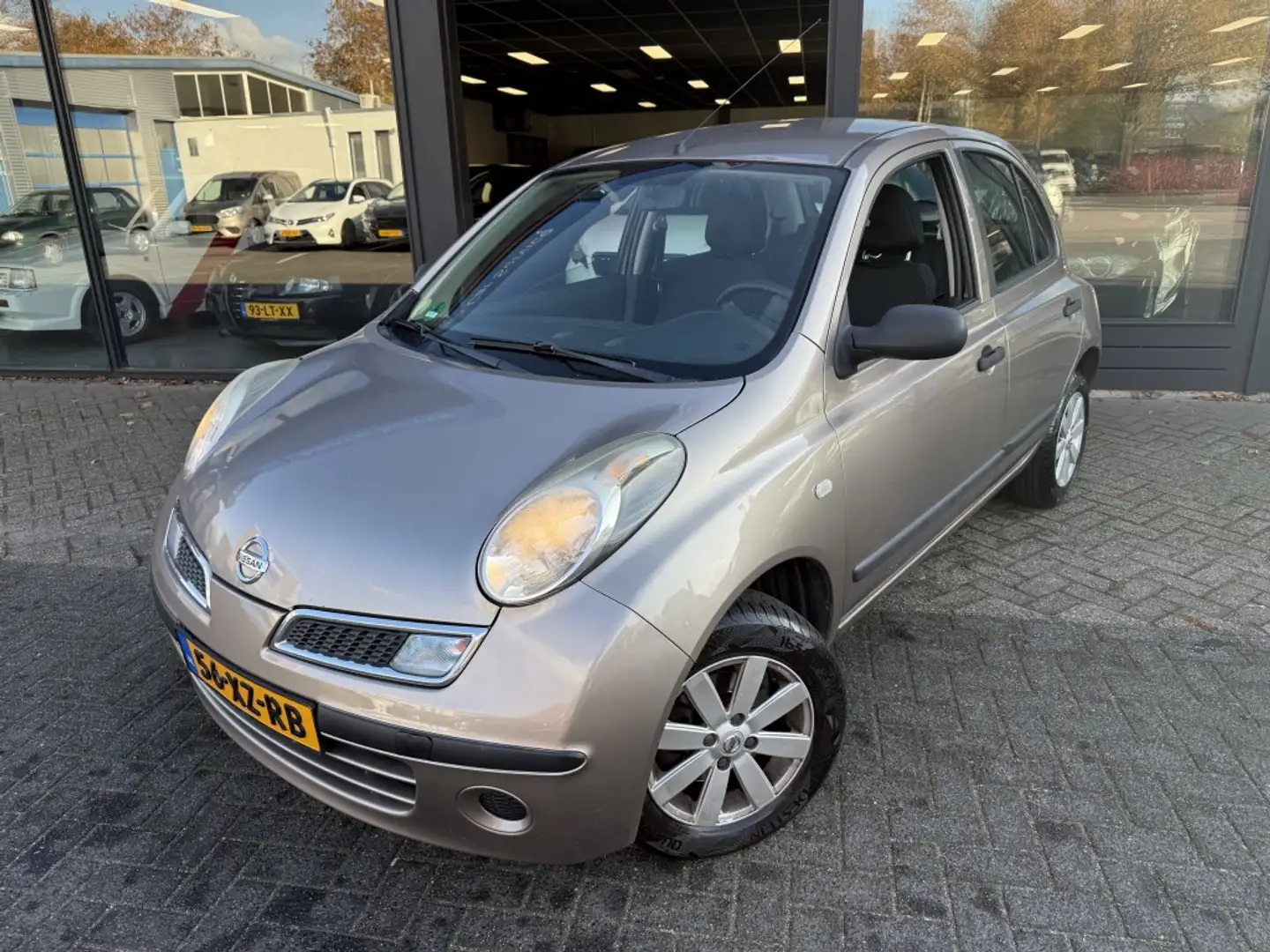 Nissan Micra 1.2 ELLE Bruin - 1