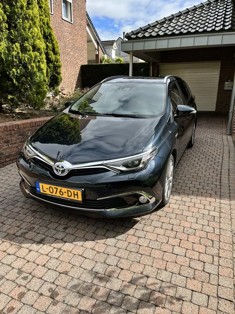 Toyota Auris 1.8 Hybr. Executive Gris - 1
