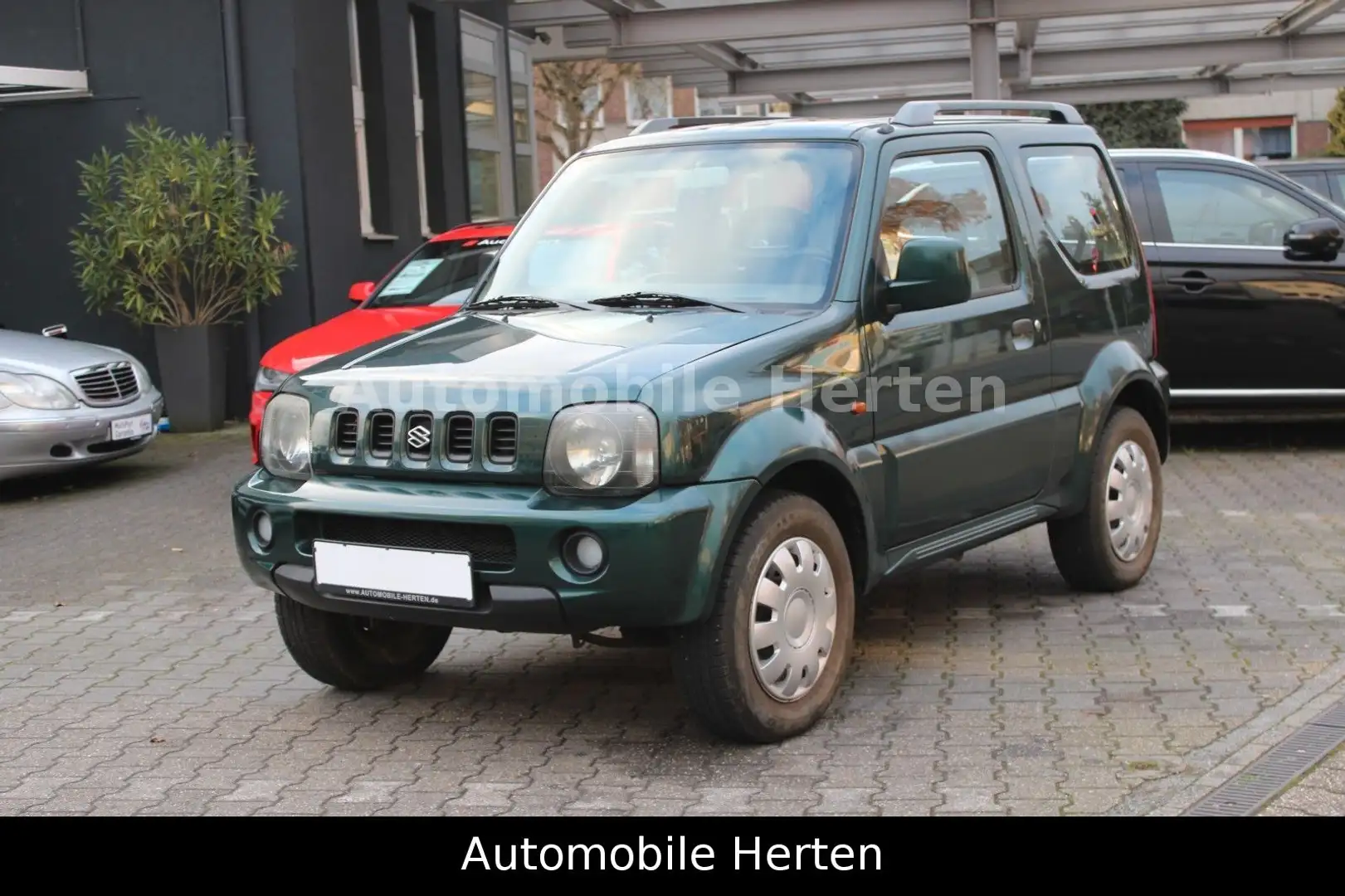 Suzuki Jimny 1.3 Ranger*AHK*KLIMA*ALLRAD*TOP! Grün - 1