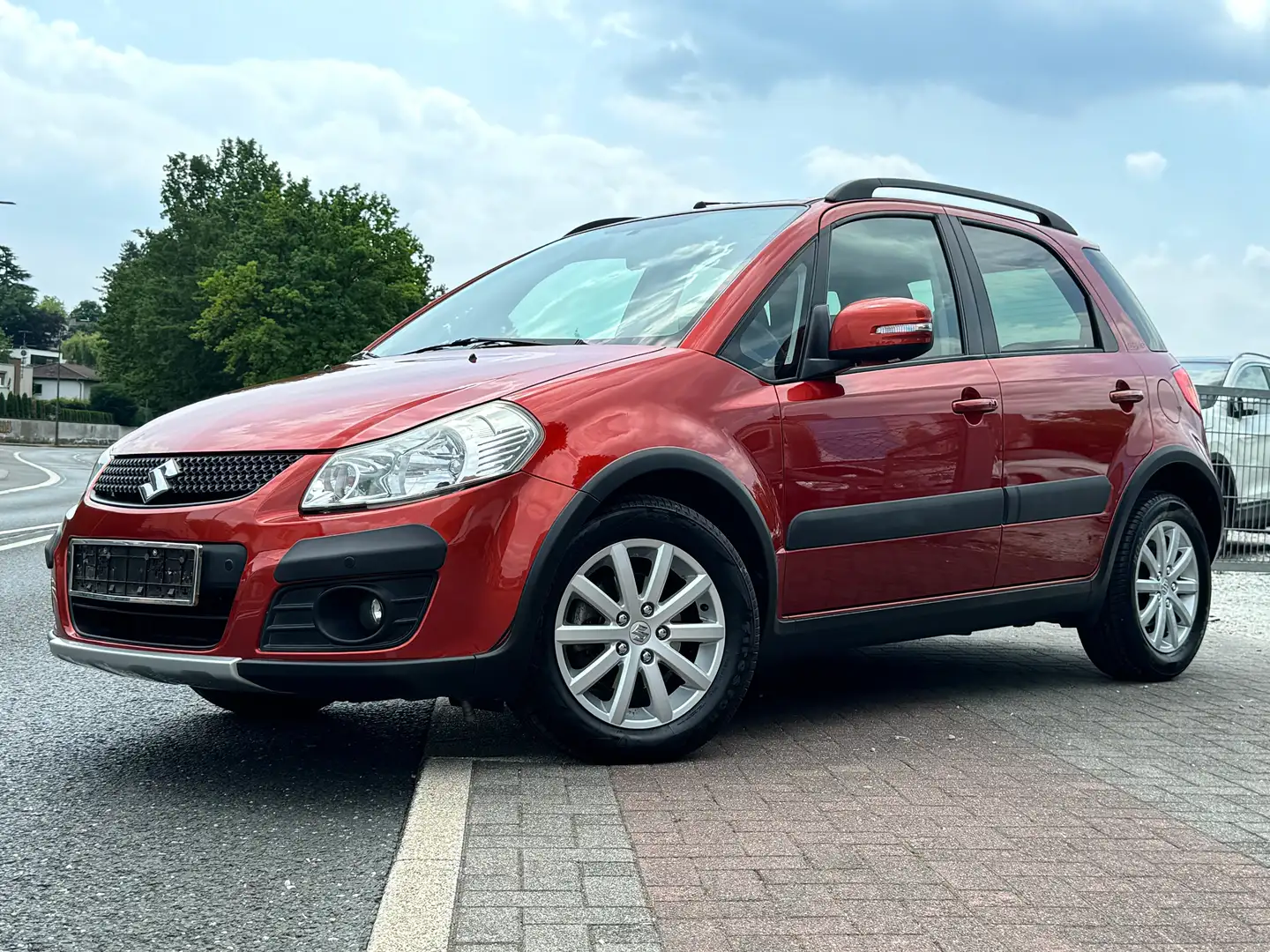 Suzuki SX4 1.6 VVT 4x2 Style Navi Standheizung Sitzheiz 1Hand Pomarańczowy - 1