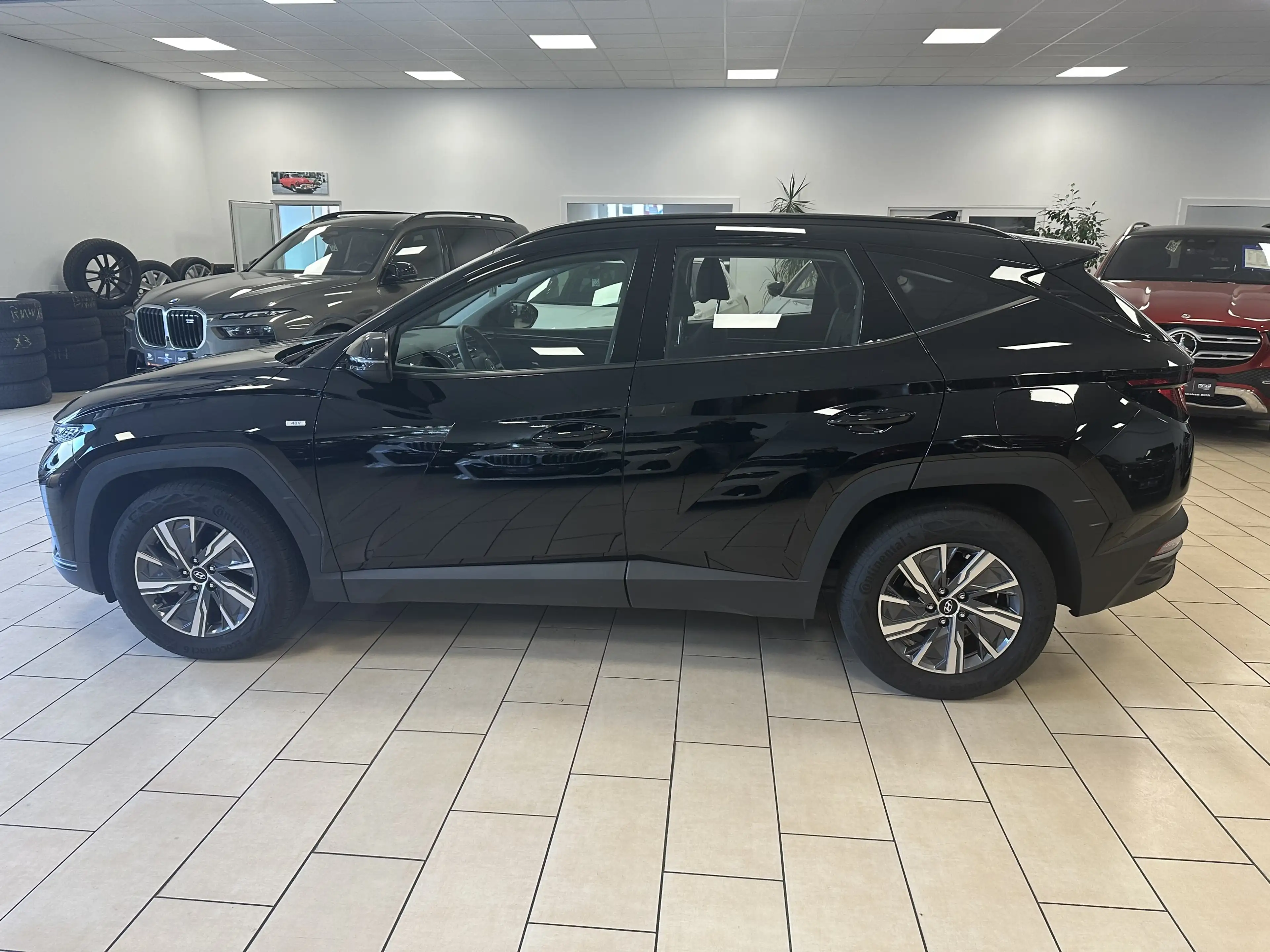 Hyundai TUCSON Select Mild-Hybrid R.Cam Navi PDC SHZ — photo 2