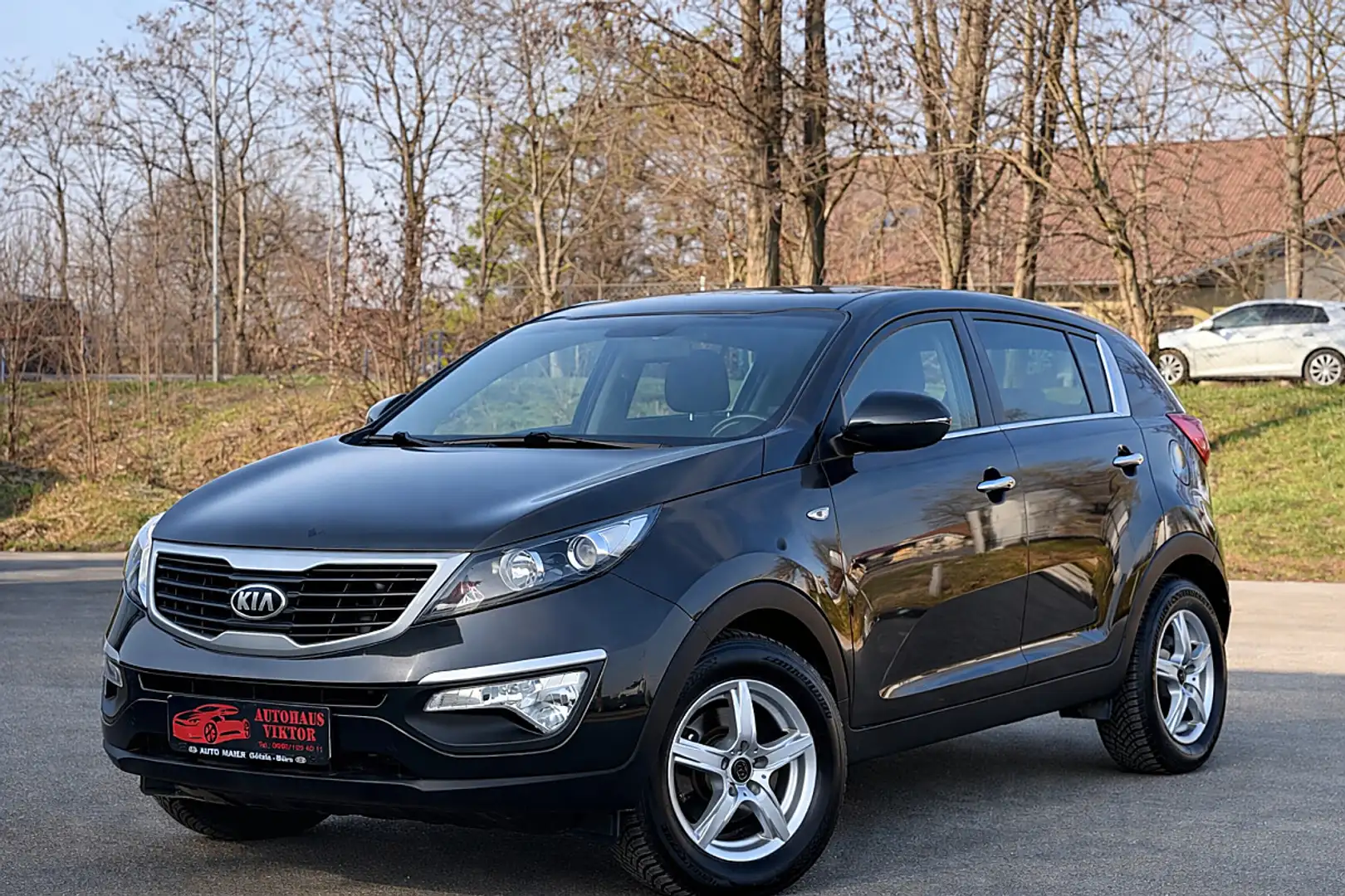 Kia Sportage Cool 1,7 CRDi 2WD ISG Österreich-Paket*GARANTIE... Schwarz - 1