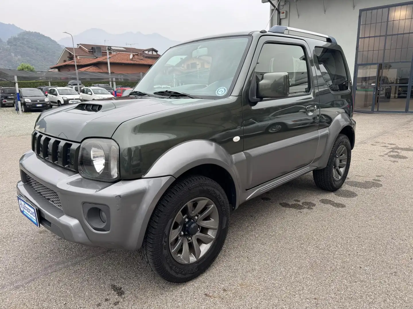 Suzuki Jimny 1.3 EVOLUTION + COME NUOVO 4WD AUTOVETTURA 4P. Vert - 1