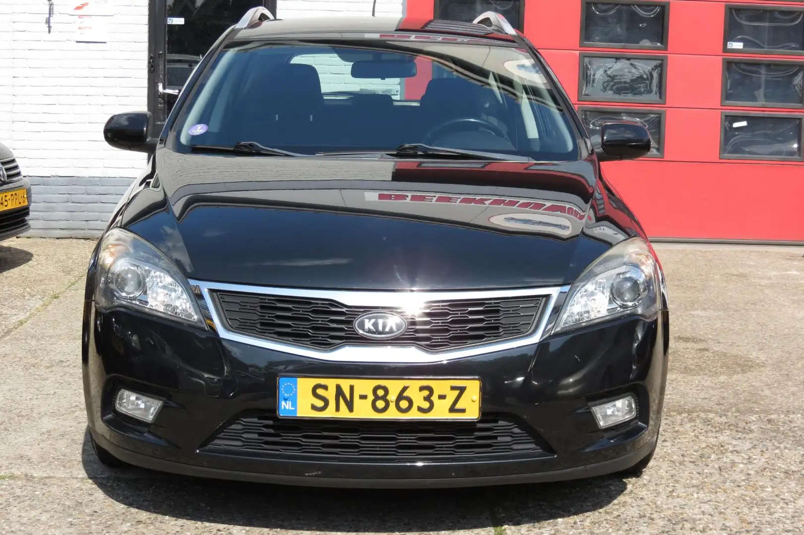 Kia Ceed / cee'd Sporty Wagon 1.4 CVVT X-ecutive , AIRCO, NAVIGATIE Zwart - 2