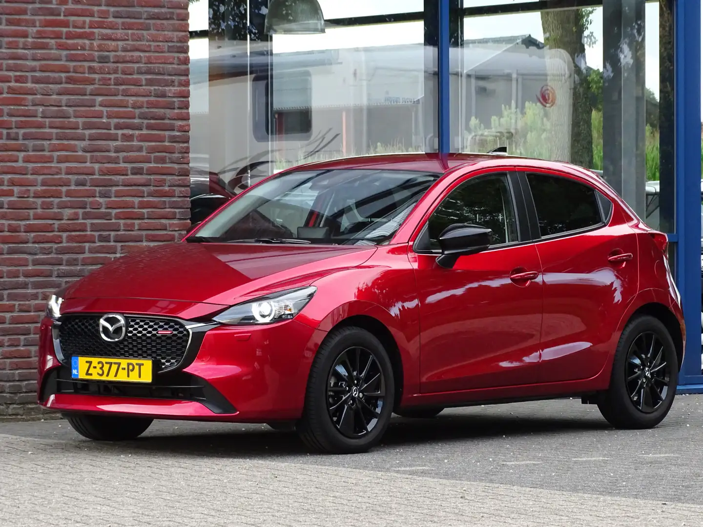 Mazda 2 1.5 SkyActiv-G 90 Homura NL AUTO Rood - 1