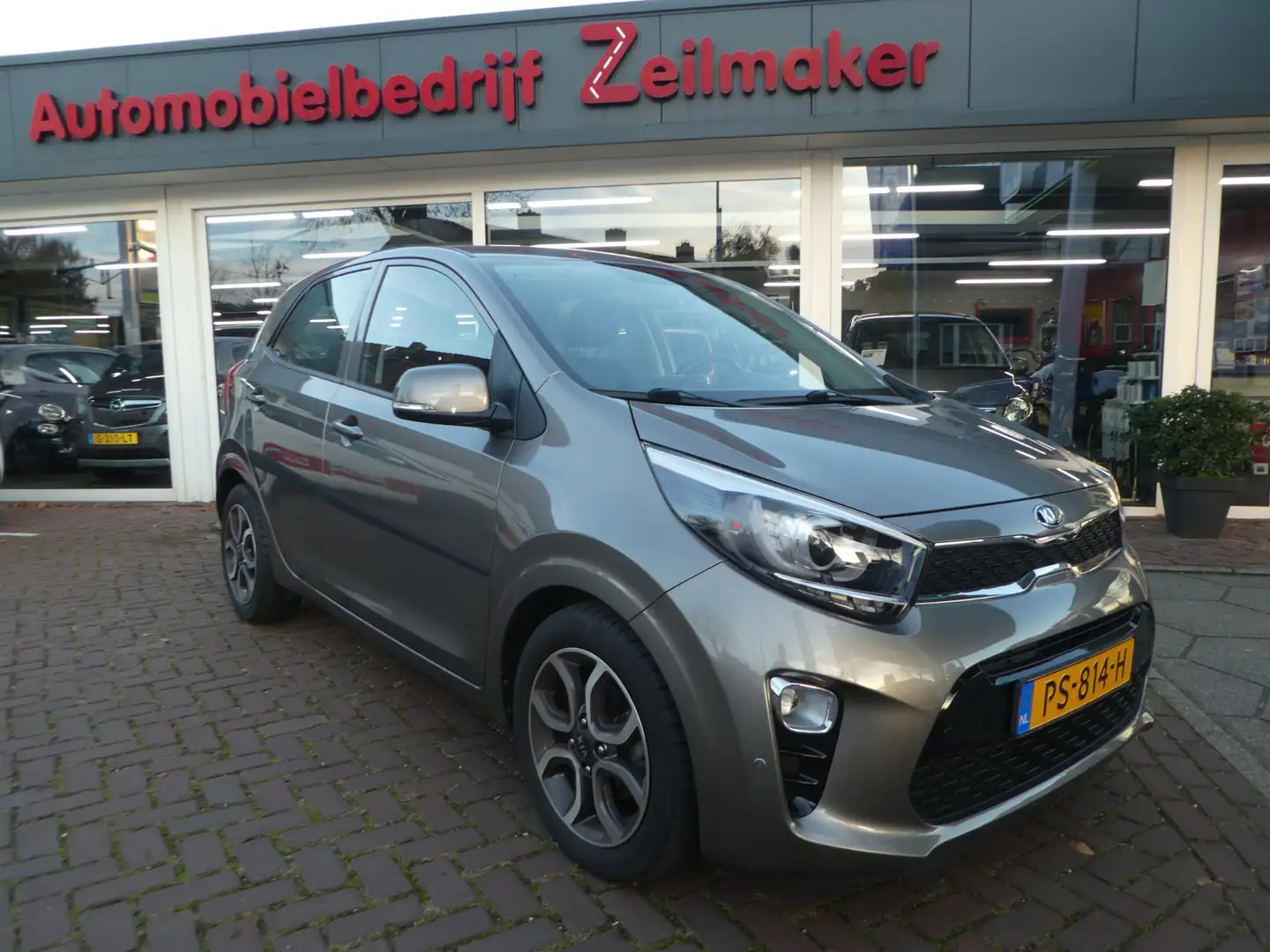 Kia Picanto 1.2 CVVT First Edition Camera, Airco(ecc), PDC V+A Grijs - 1