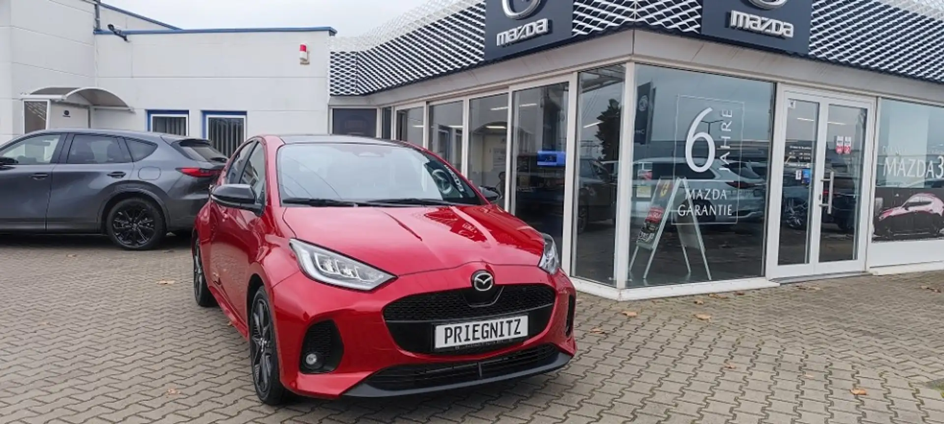 Mazda 2 HYB 1.5L Hybrid VVT-i Hybrid, Automatik Rot - 2