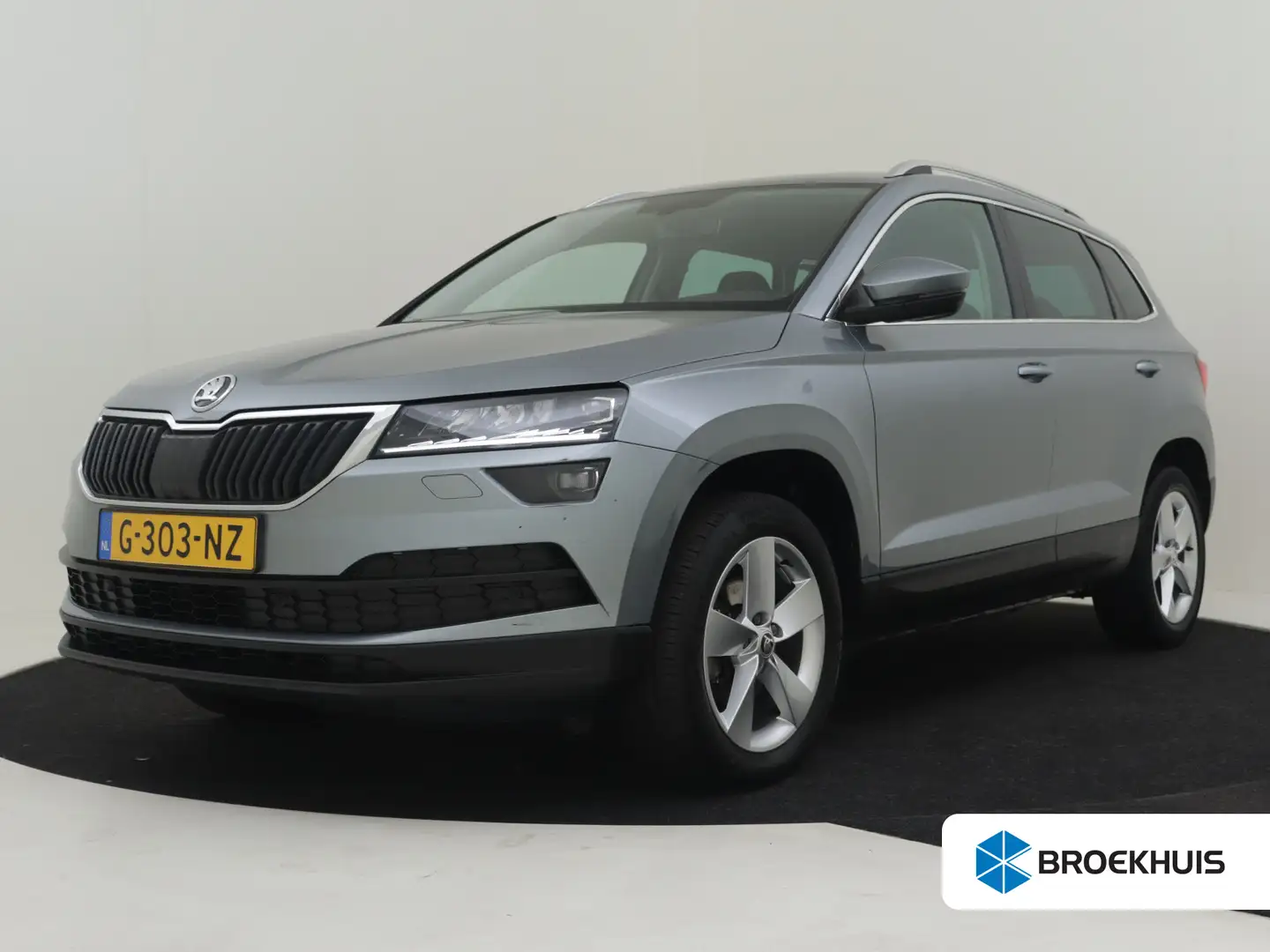 Skoda Karoq 1.0 TSI Business Edition 115pk | Trekhaak | Cruise Grijs - 1
