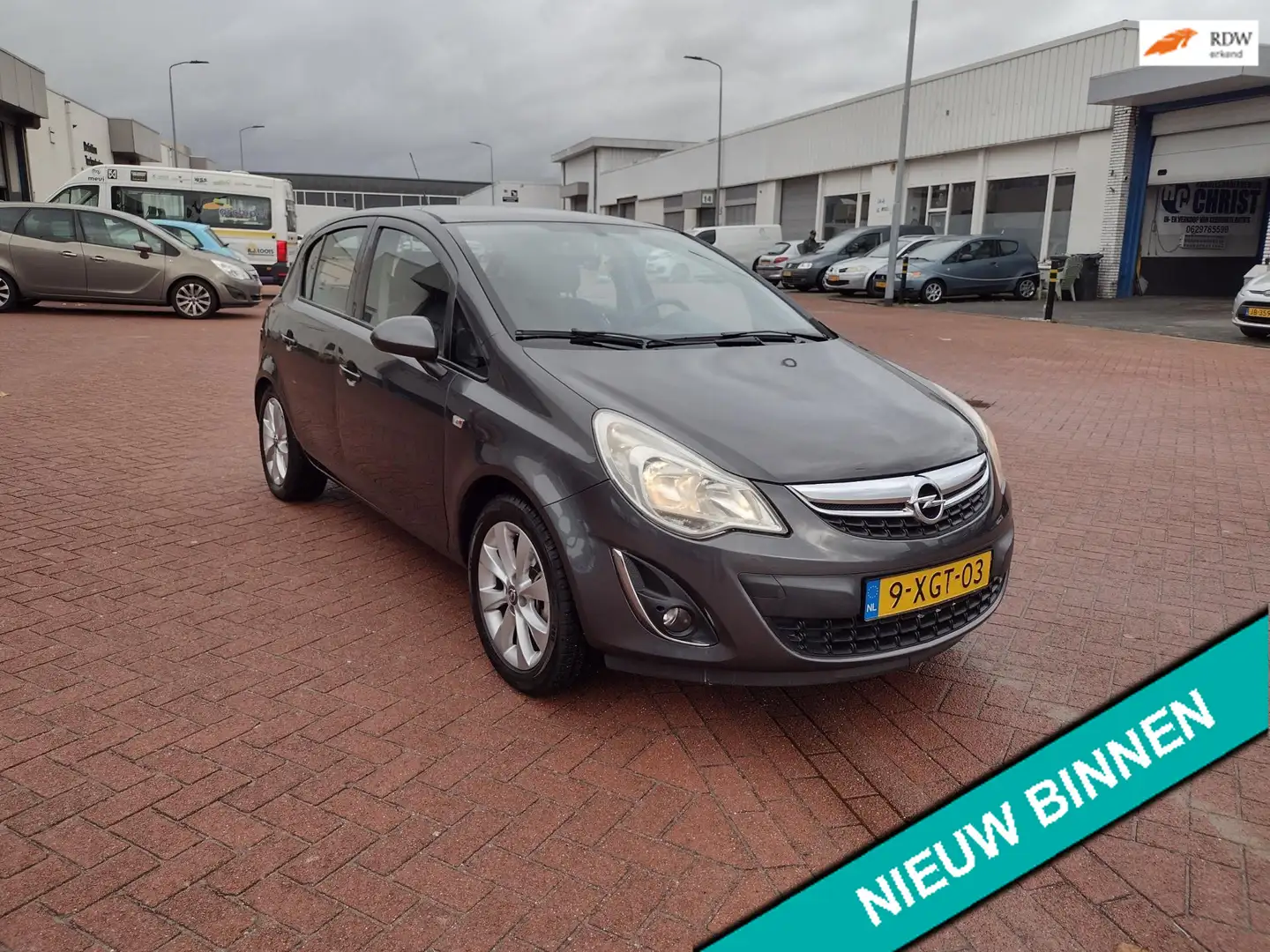 Opel Corsa 1.2-16V Cosmo MOOIE AUTO BEL 0619590613 5 DRS AIRC Gris - 1