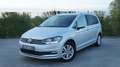 Volkswagen Touran 1.5 TSI 150pk Highline DSG Navi Camera Pdc 12m Gar Plateado - thumbnail 1