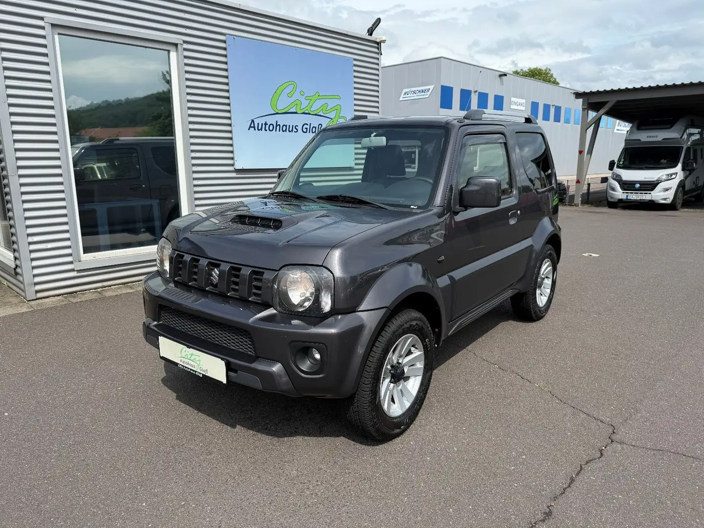 Suzuki Jimny 1.3 4WD Style+AHK+Shz+Klima+Teilleder Gris - 1