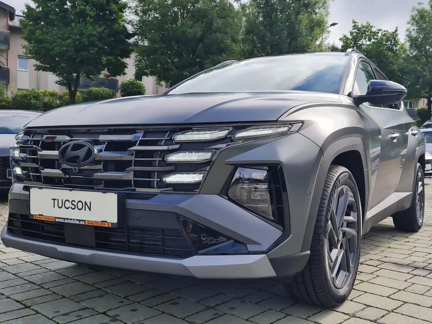 Hyundai TUCSON 1,6 T-GDI HEV 4WD 20th Anniversary Aut. Grün - 1