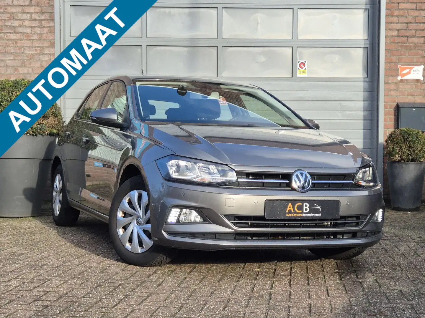 Volkswagen Polo 1.0 TSI Comfortline Business Automaat Apple-Carpla Grau - 1