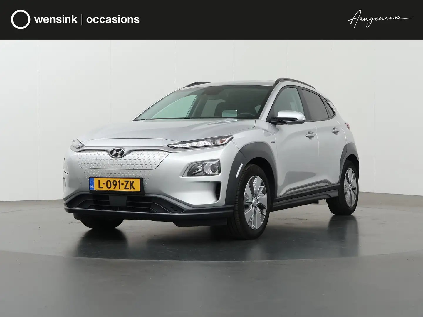 Hyundai KONA EV Fashion 64 kWh | Schuif/Kanteldak | Warmtepomp Grijs - 1