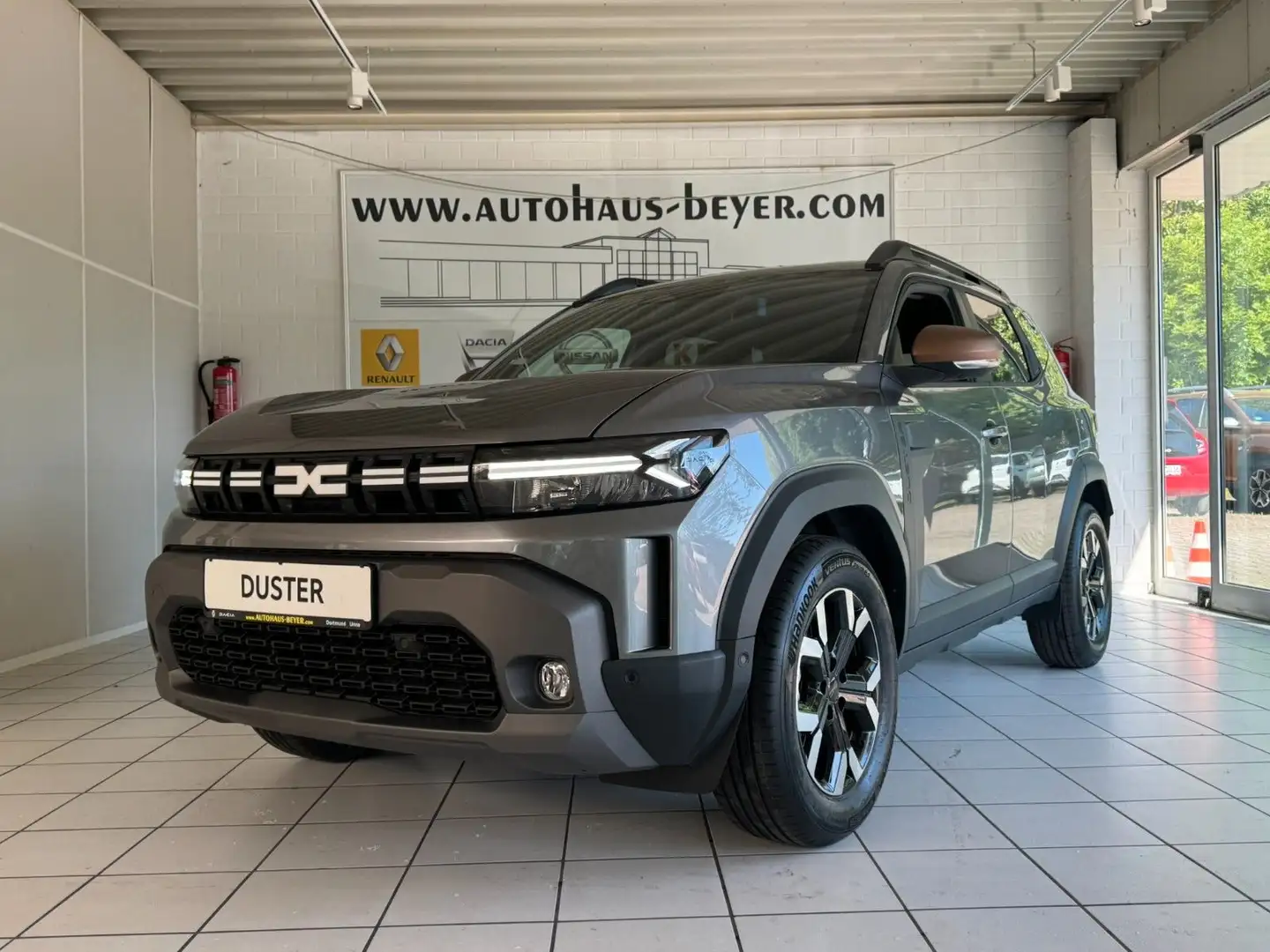 Dacia Duster III ECO-G 100 Extreme Grijs - 1