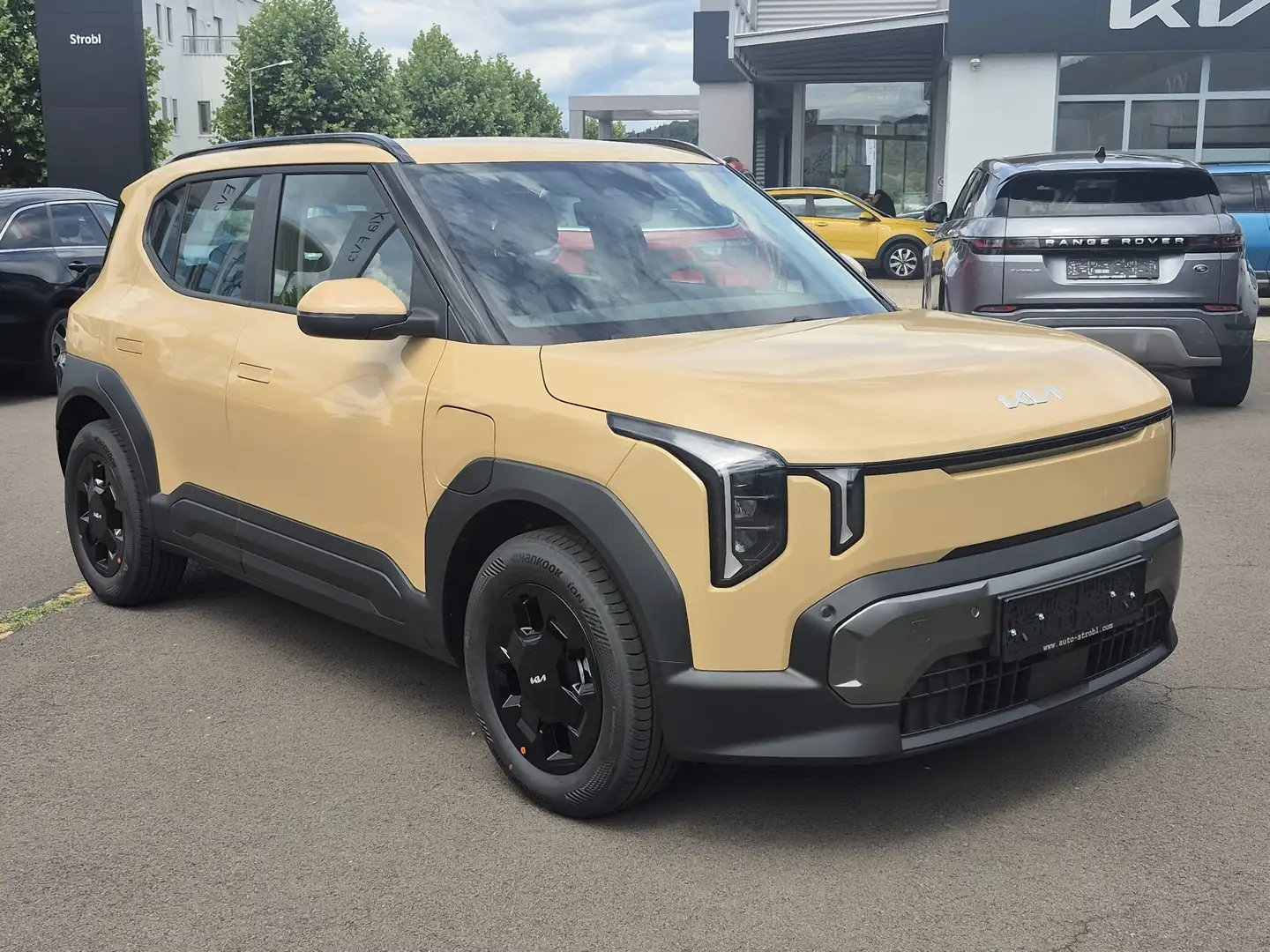 Kia EV2 5S FWD 42,2kWh Earth Lagernd, 25.800€ Leasing Gelb - 1