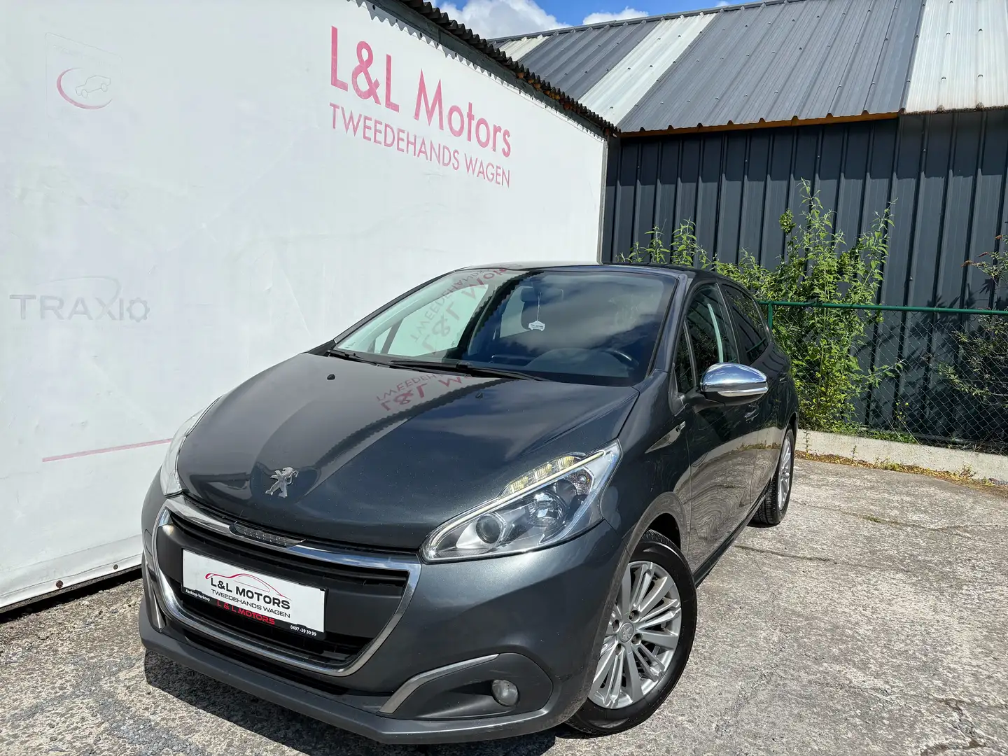 Peugeot 208 208 1.6 BlueHDi Style*Navi Cruise Pdc Alu 16"* Grijs - 1