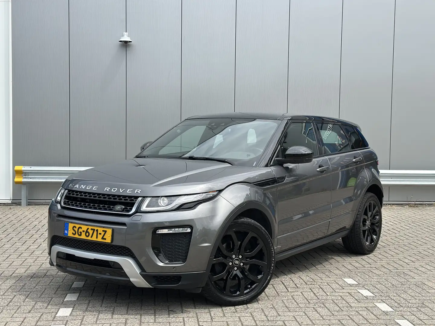 Land Rover Range Rover Evoque 2.0 Si4 HSE Dynamic | Groot scherm | Pano | Vol. Grijs - 1