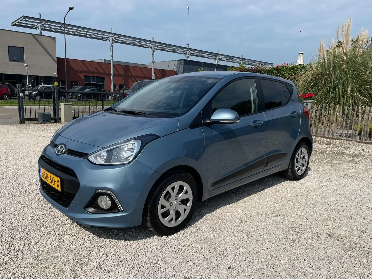 Hyundai i10 1.0i i-Motion Premium Climate, Cruise, Parkeersens Blauw - 2