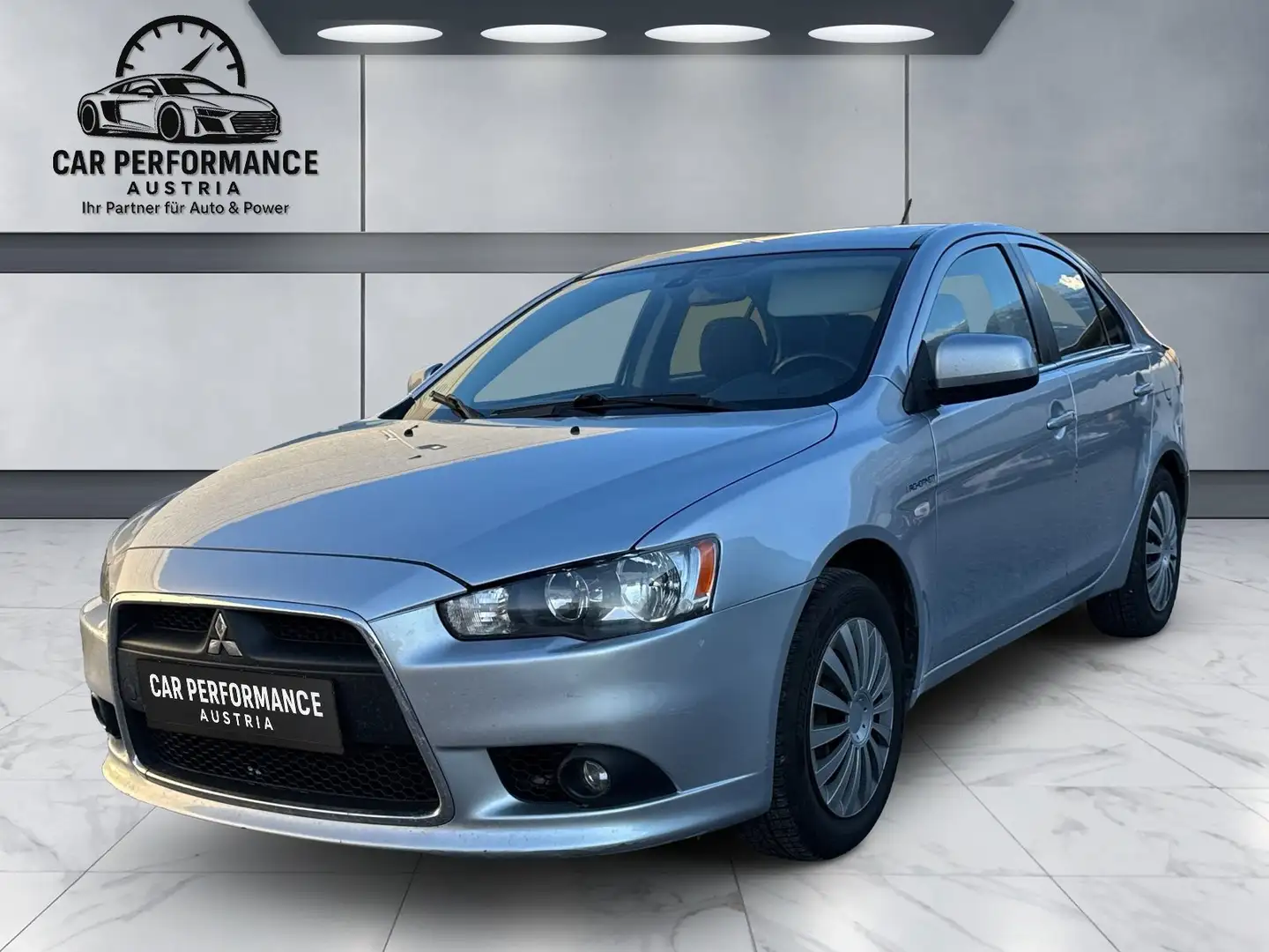 Mitsubishi Lancer Inform Grau - 1