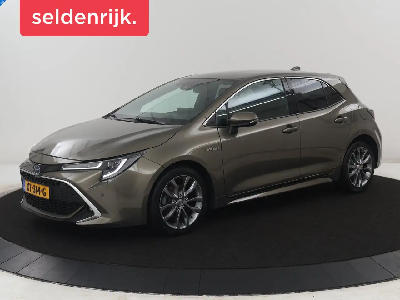 Toyota Corolla 1.8 Hybrid Executive | Leder/alcantara | Stoelverw — photo 1 of 37