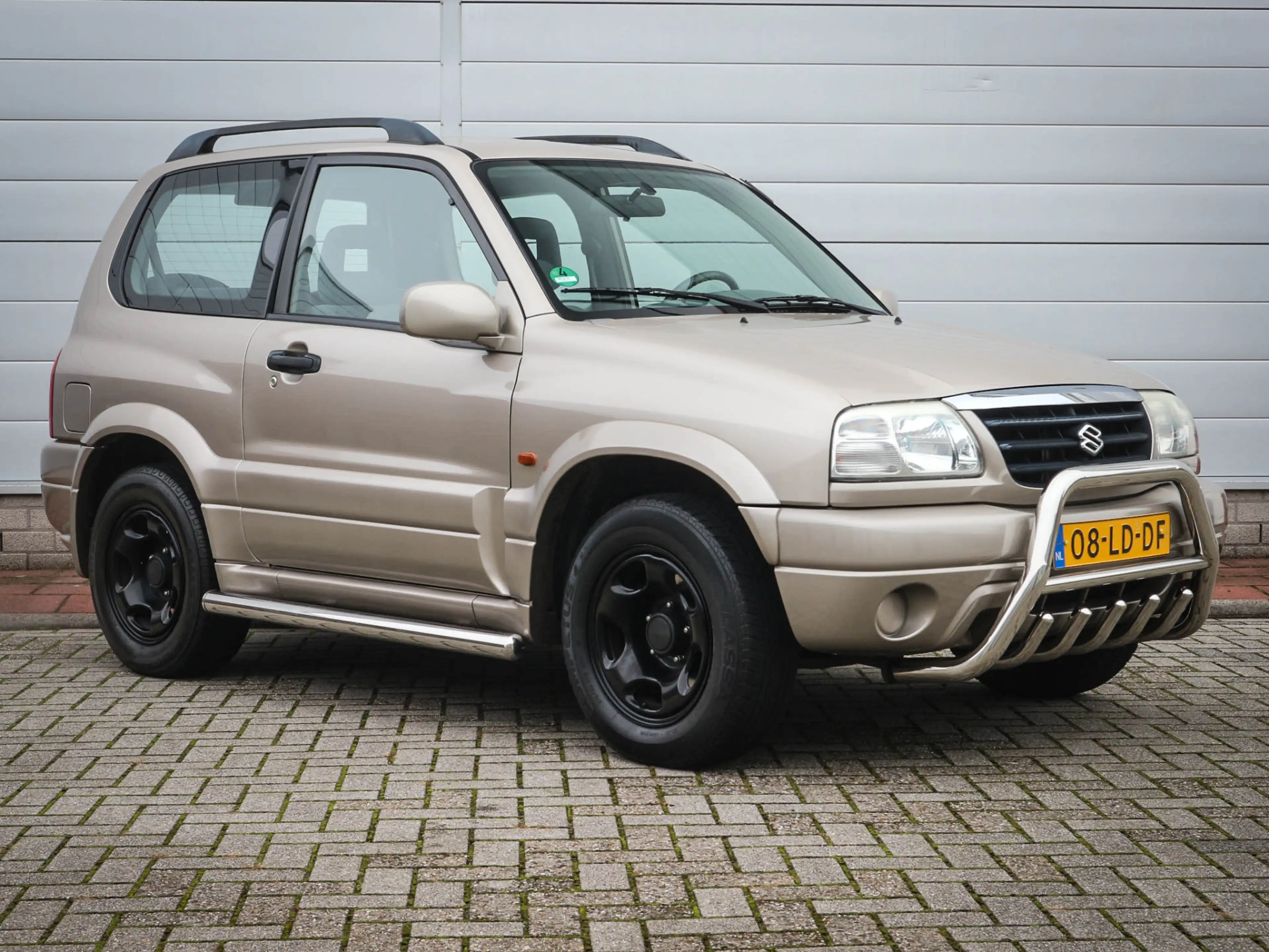 Suzuki Grand Vitara 1.6 Metal Top Wide Body | Audio | Elektrische rame — photo 13