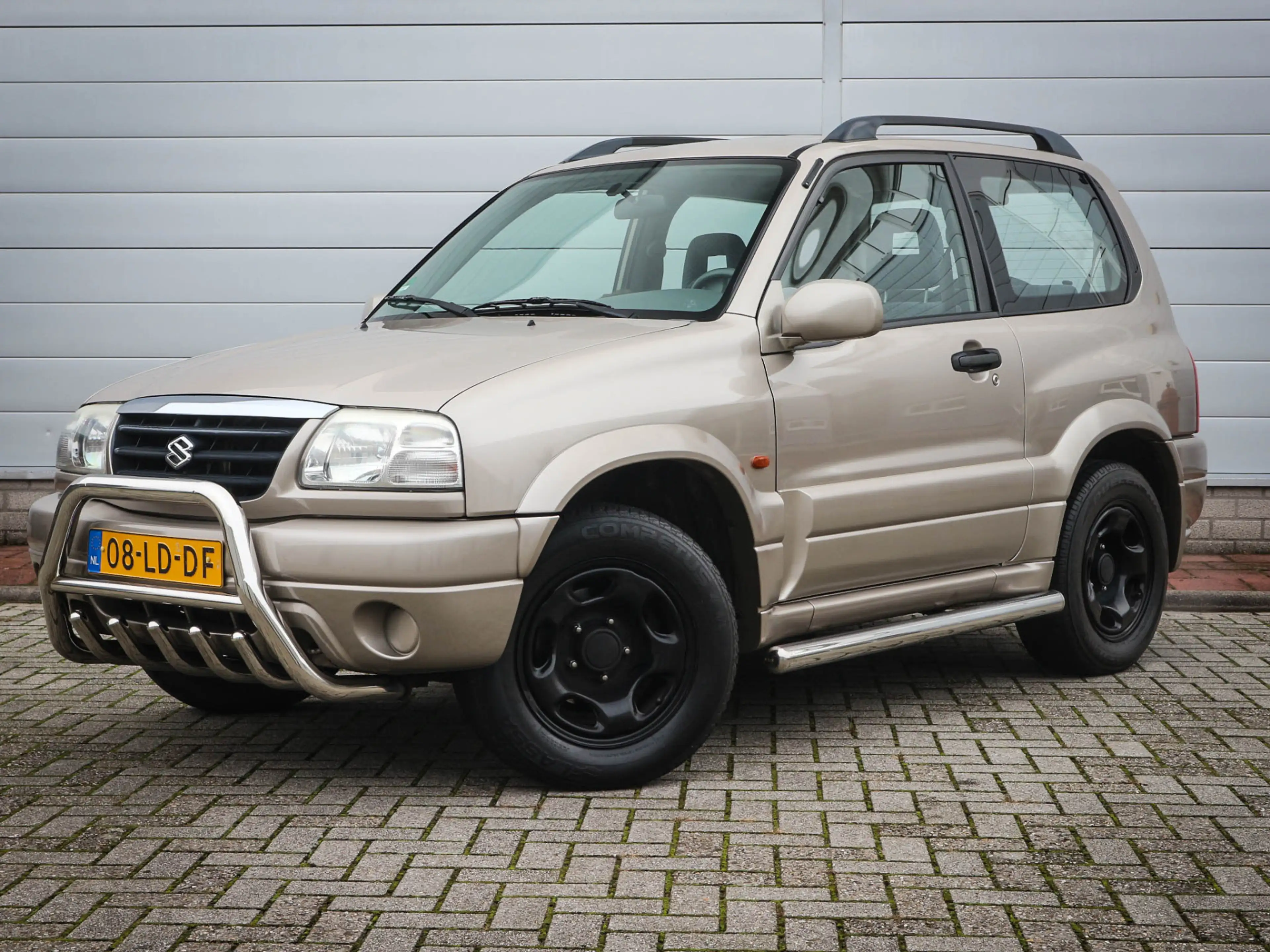 Suzuki Grand Vitara 1.6 Metal Top Wide Body | Audio | Elektrische rame — photo 8